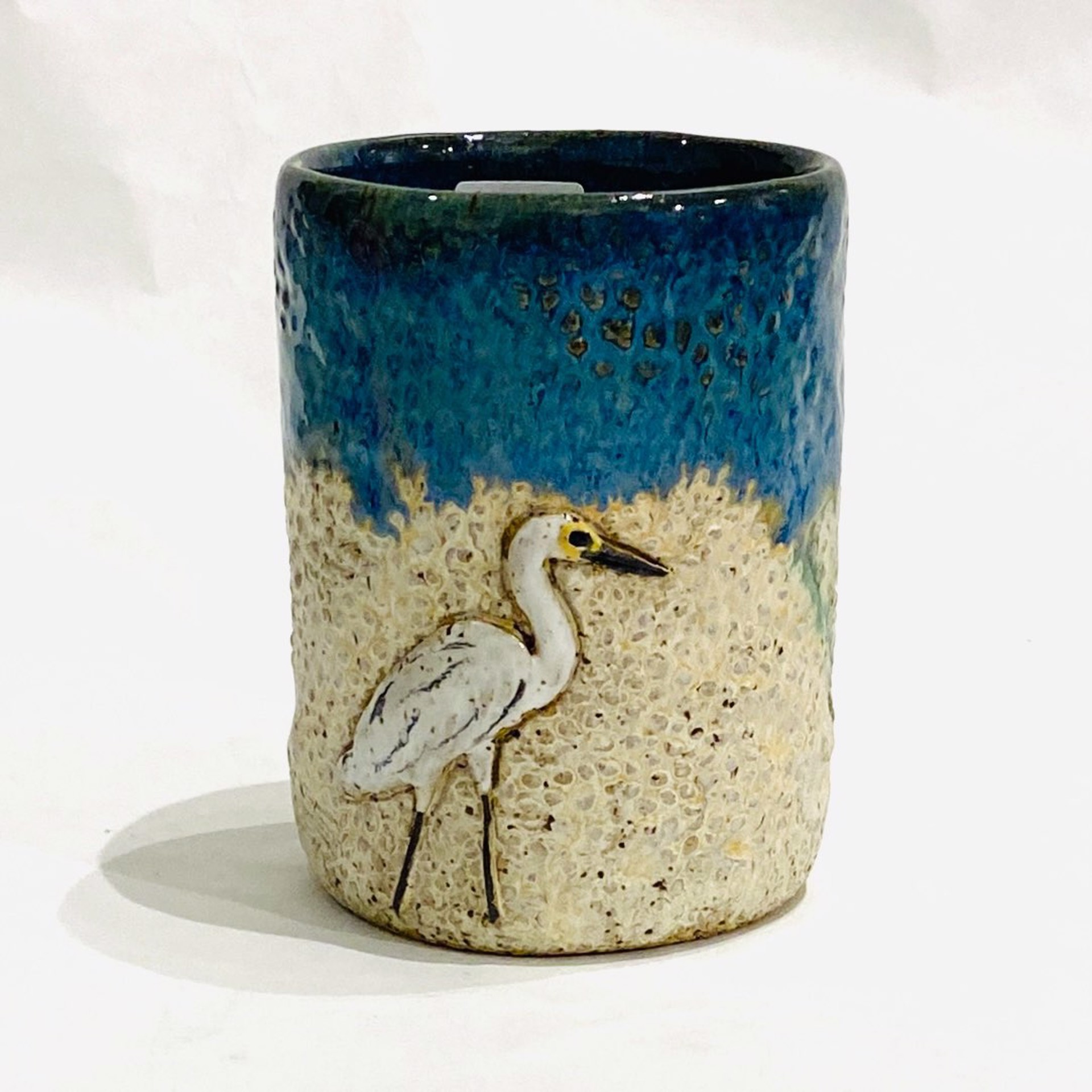 LG23-975a Heron Mug (Green Glaze) by Jim & Steffi Logan