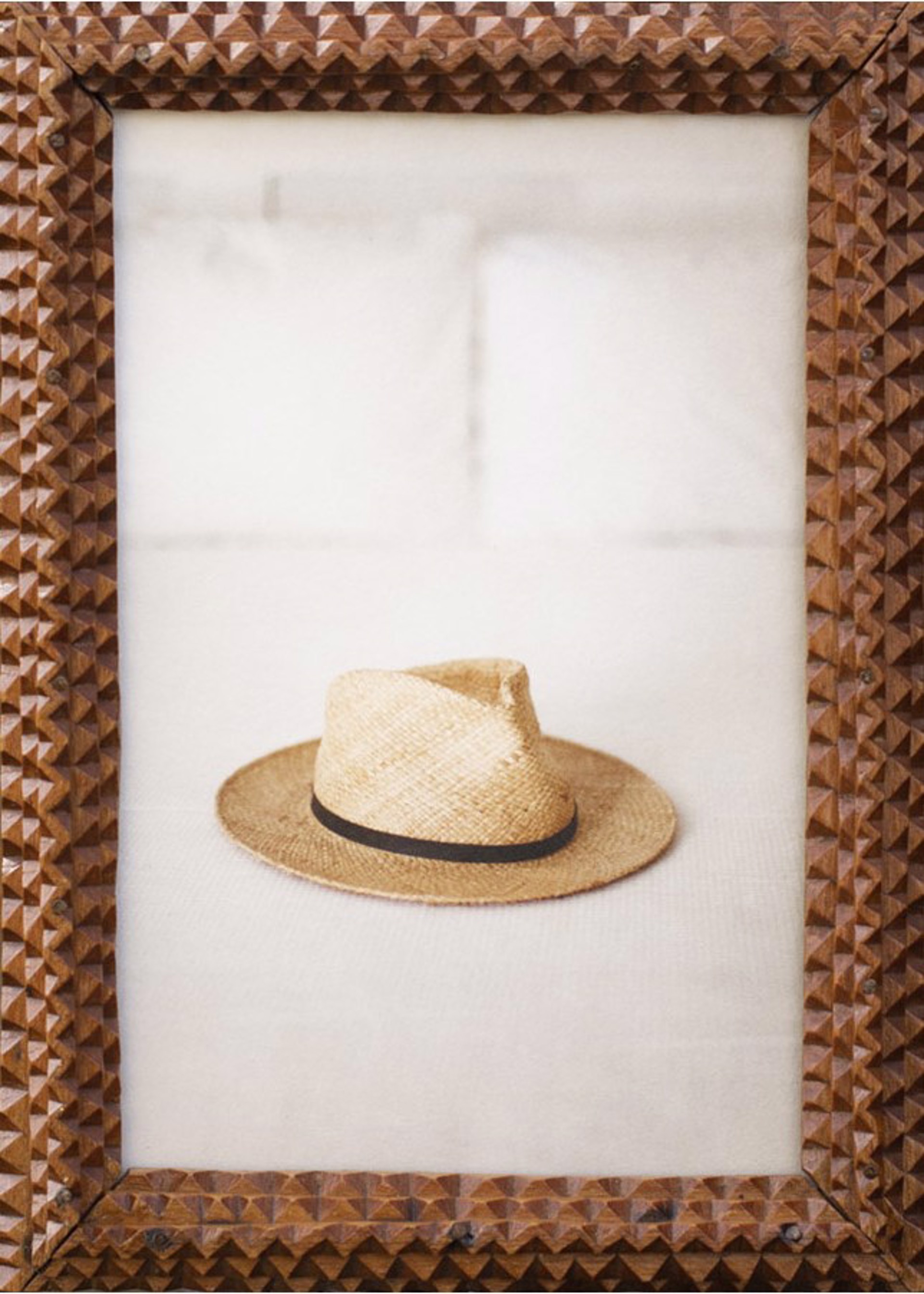Hat on a Bed by Jefferson Hayman