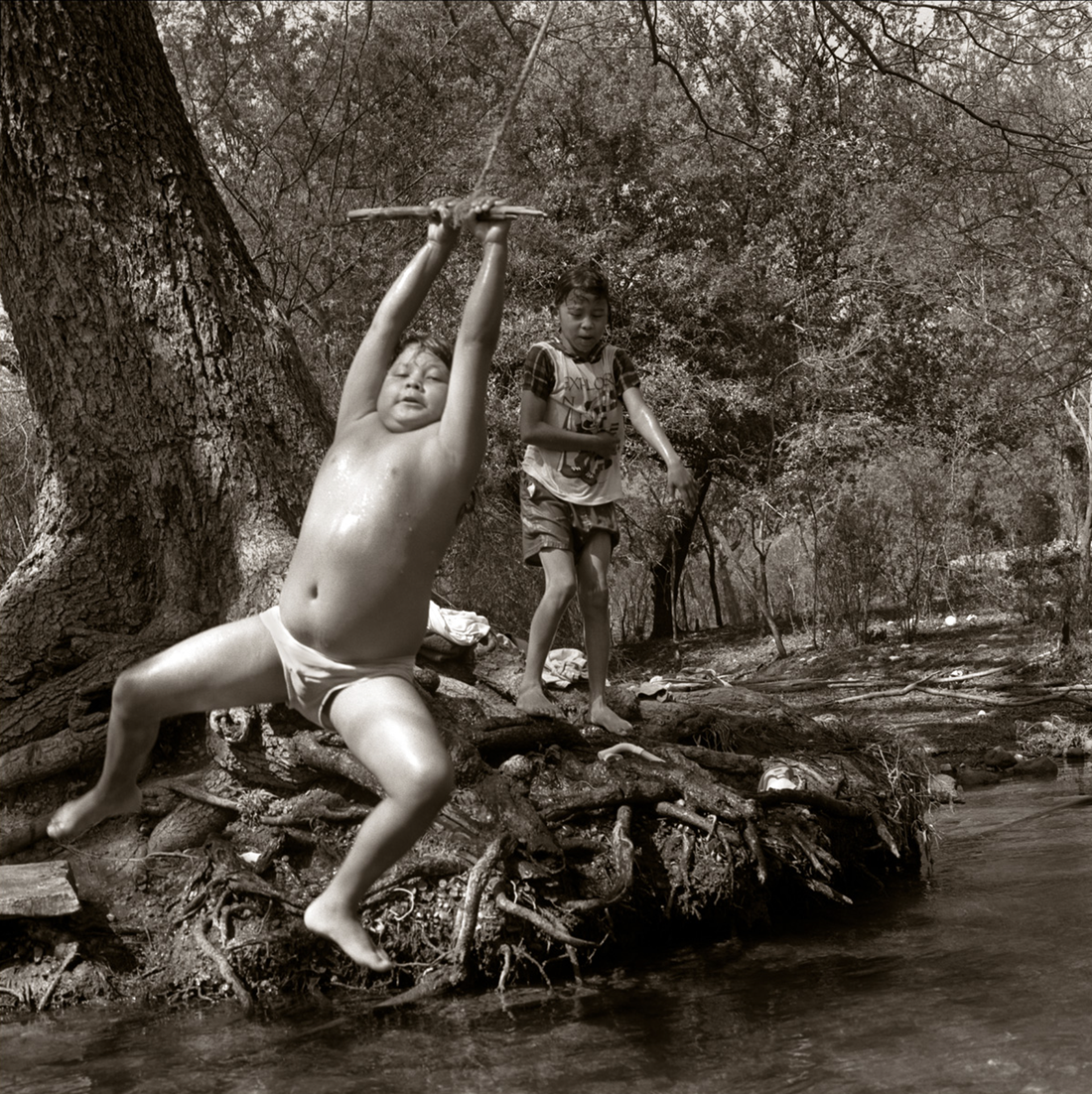 Kickapoo Boy Swinging by James H. Evans