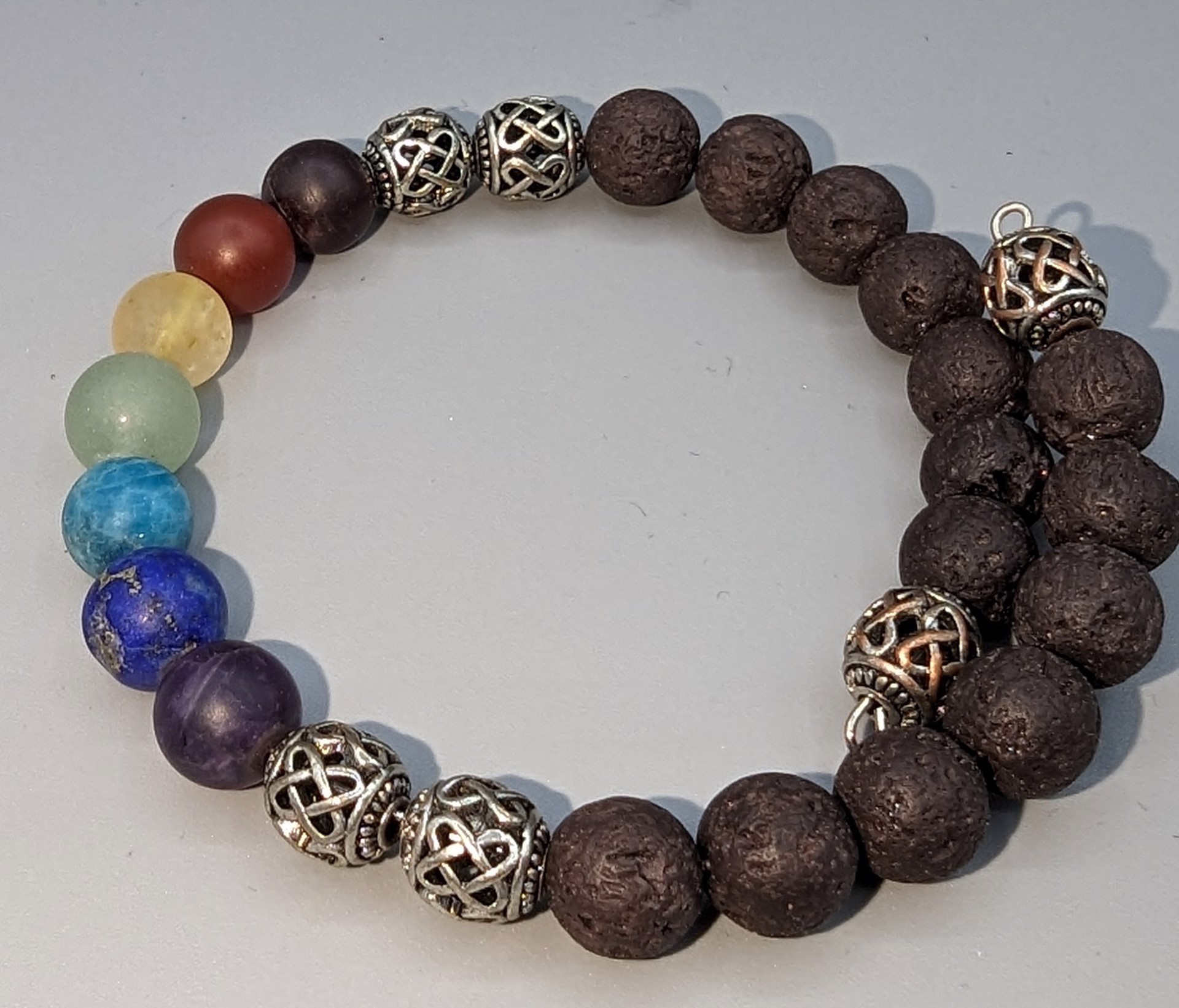 Chakra & Lava bead memory wire bracelet by Betty Binder