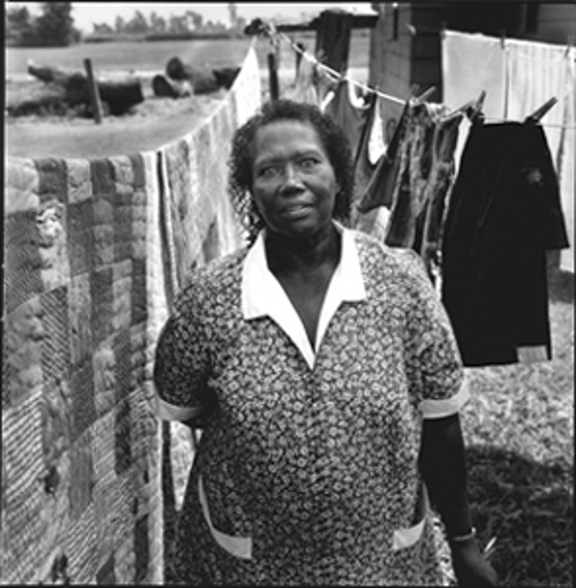 Woman with Quilt by Bill Steber