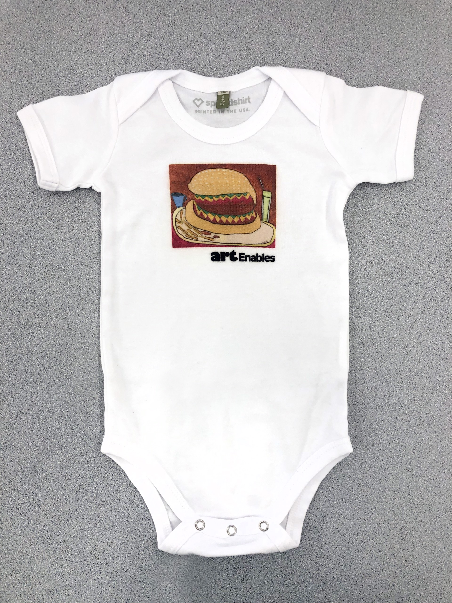 Baby Onesie - Hamburger (Max Poznerzon) 6 mo. (white) by Art Enables Merchandise