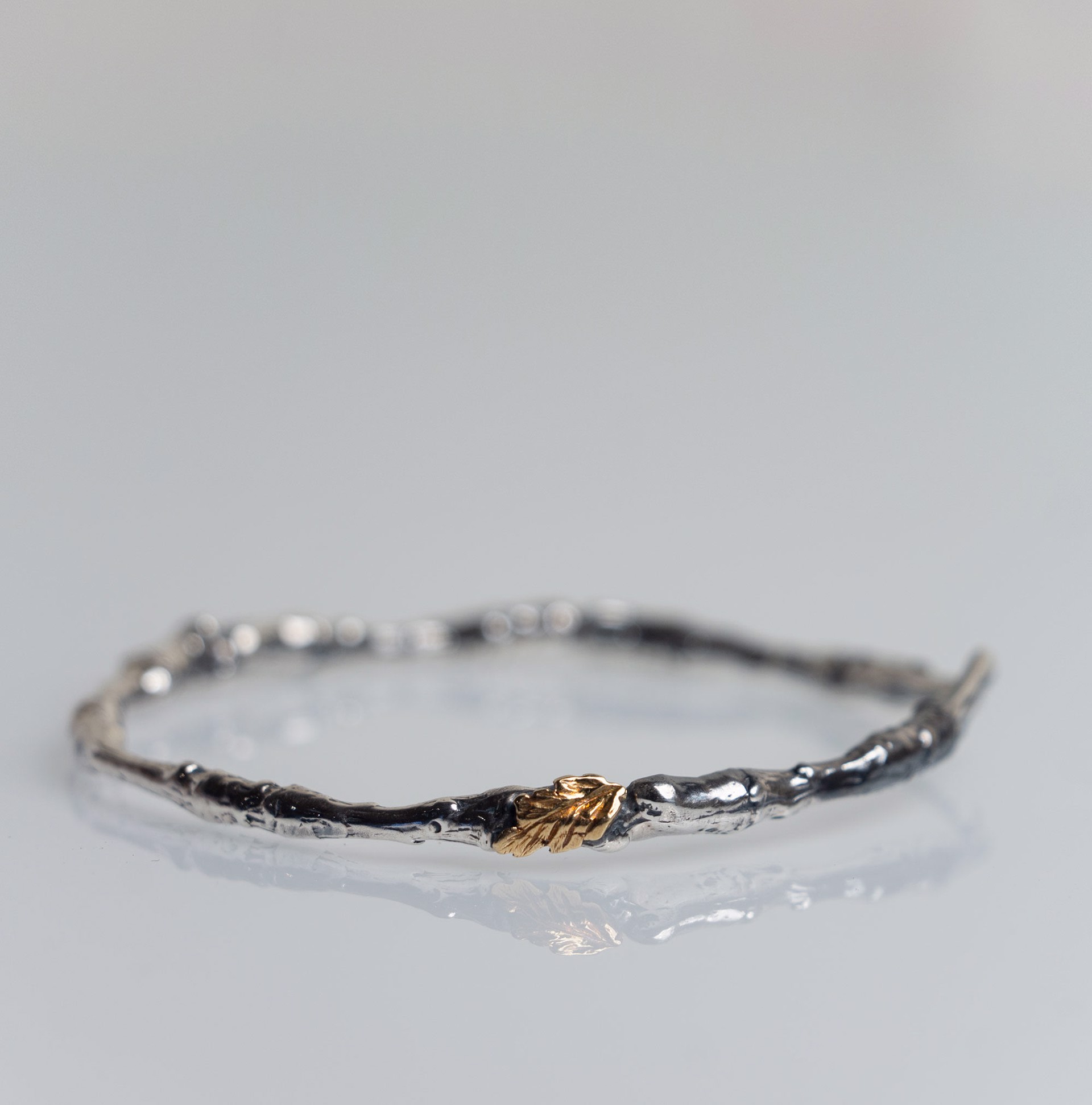 Apple Branch Bangle with Gold Leaf by Karla Hackman