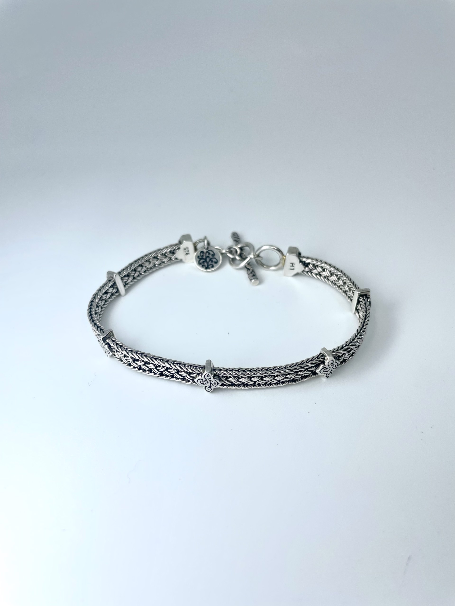 1030 Thin Woven Bracelet by Lois Hill