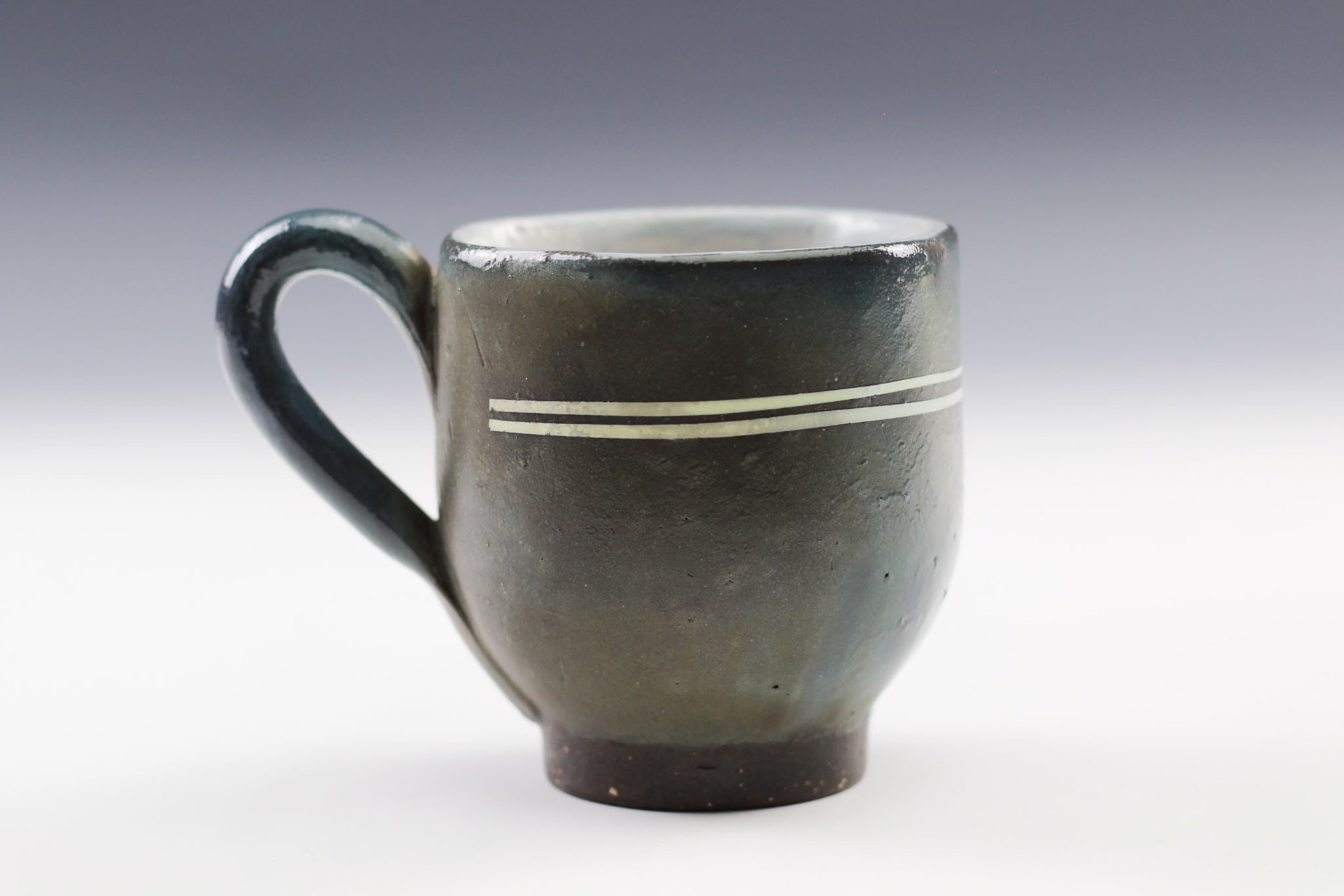 7-Sided Mug by Tom Jaszczak