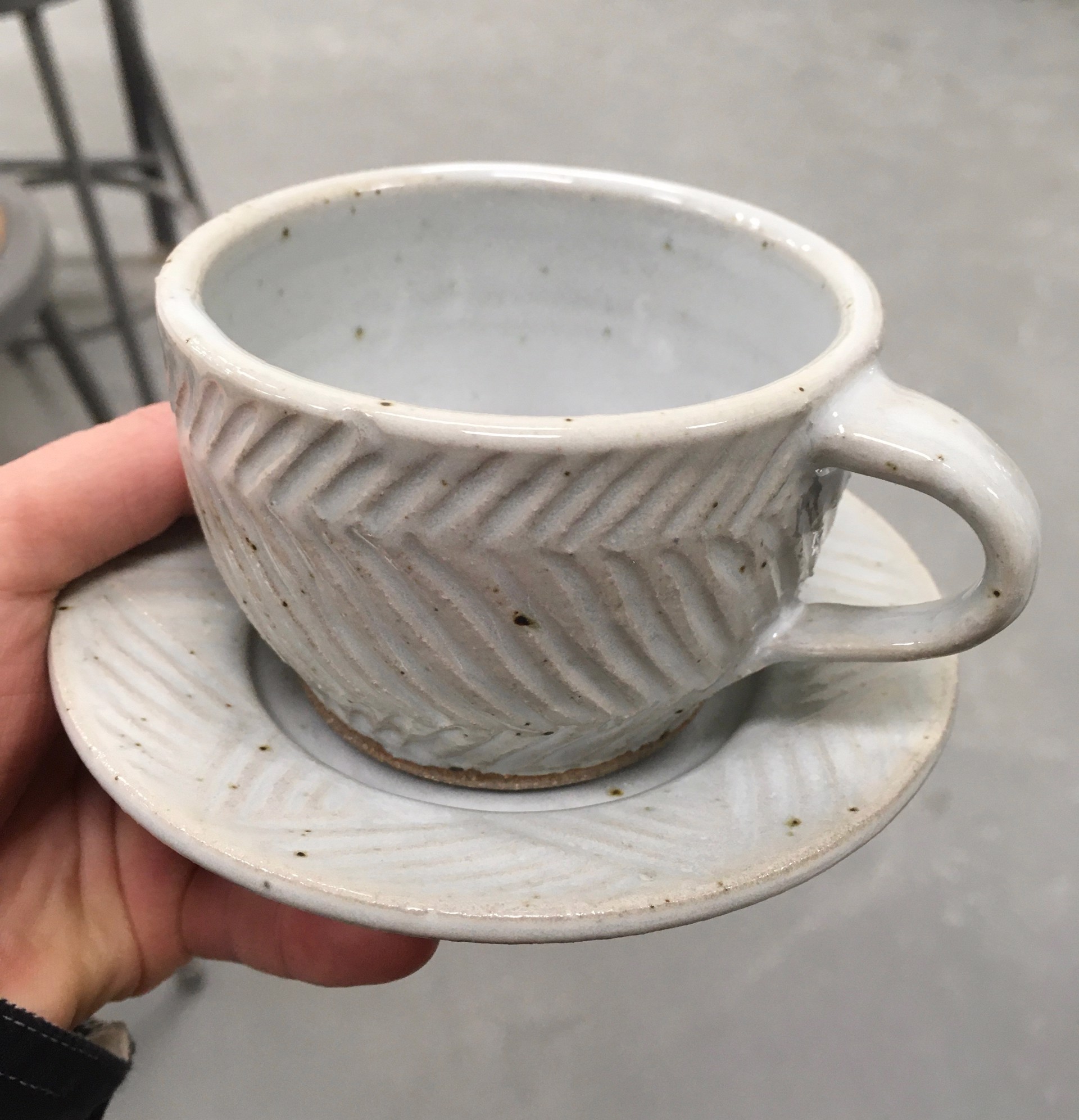Teacup, angle carved by Monica Plank