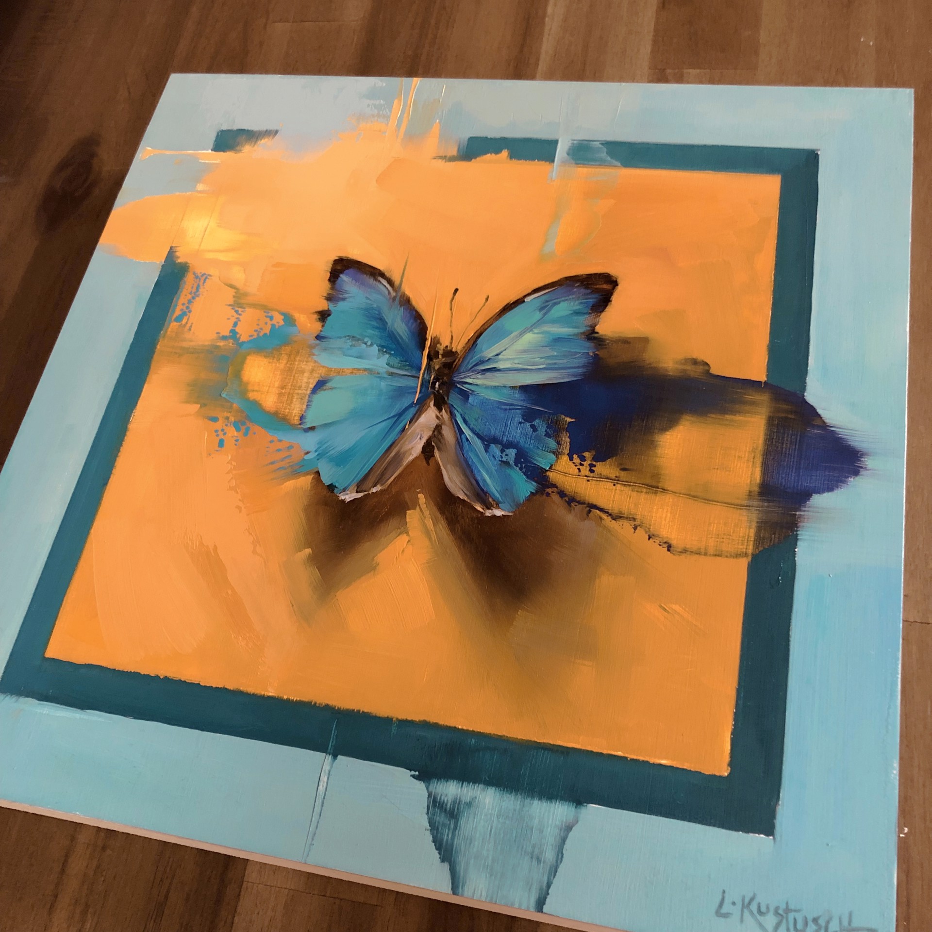 The Blue Morpho on Shades of Tangerine & Teal by Lindsey Kustusch