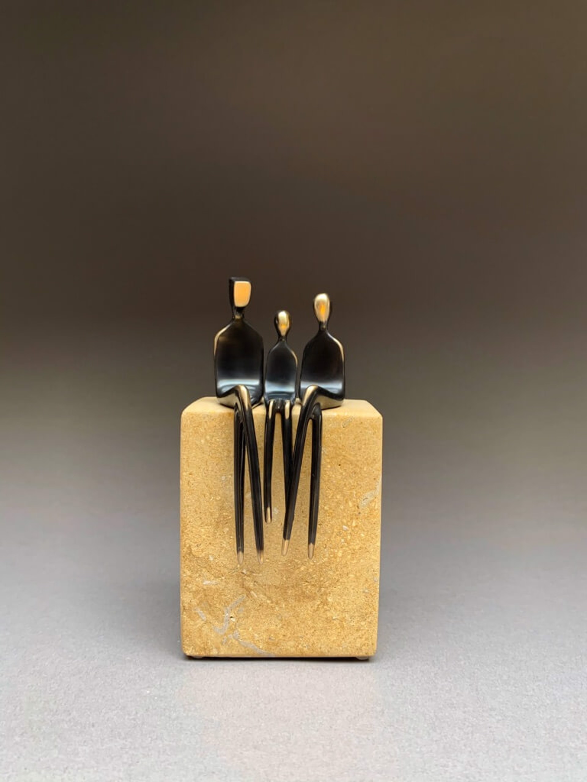 Family of Three ~ Mounted on Tan Limestone by Yenny Cocq