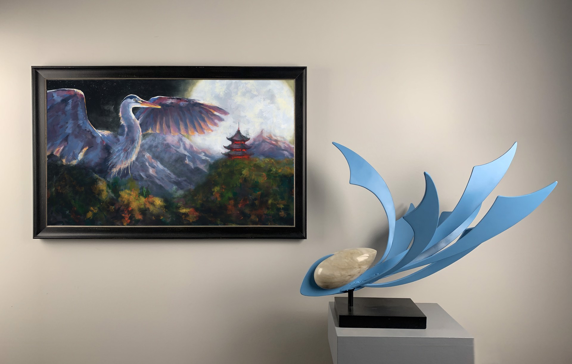 An image depicting a sculpture and painting by fine artist John McLeod.