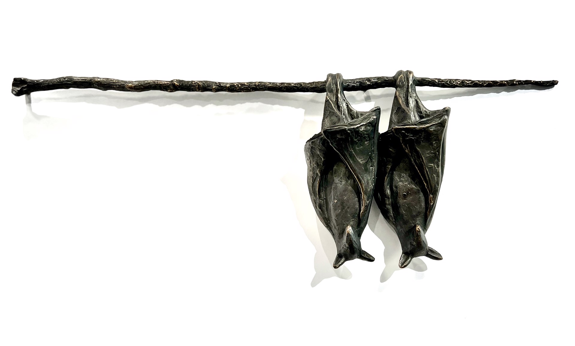 Pair of Bats on a Branch by Copper Tritscheller