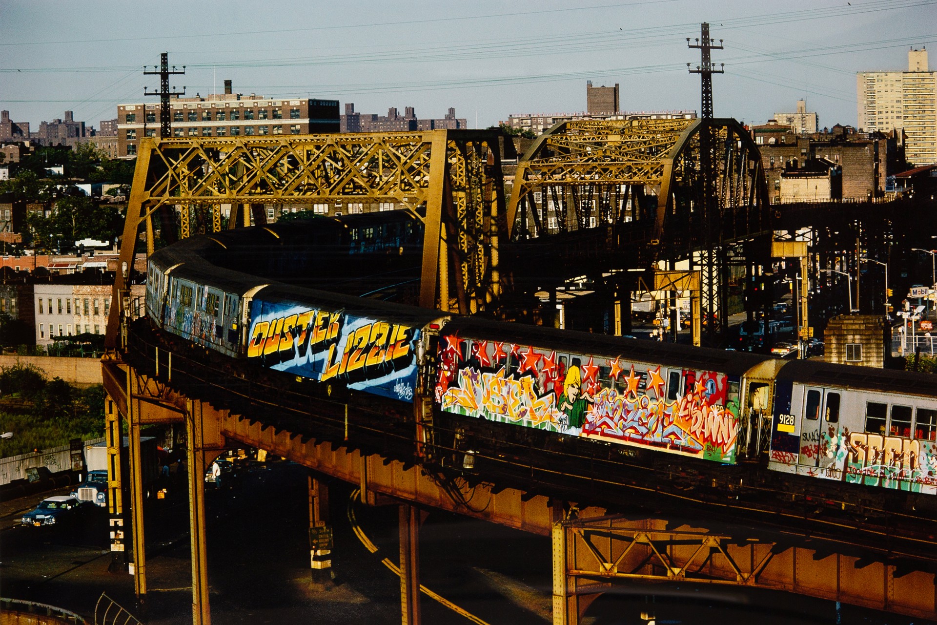 2 Whole Cars in Straight Letters and Wild Style by Duster Lizzie, Bronx, NY by Martha Cooper