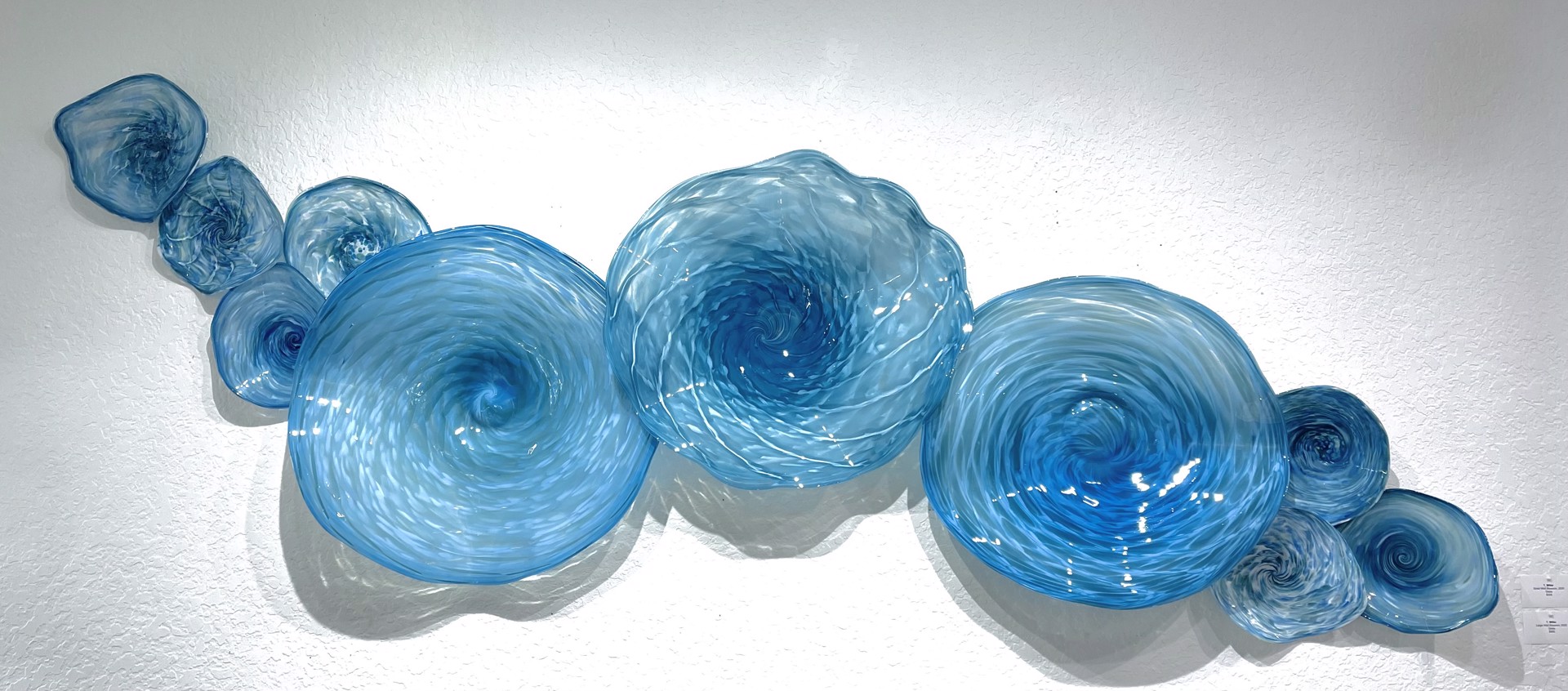10-Piece Blue Glass Installation by T. Miller