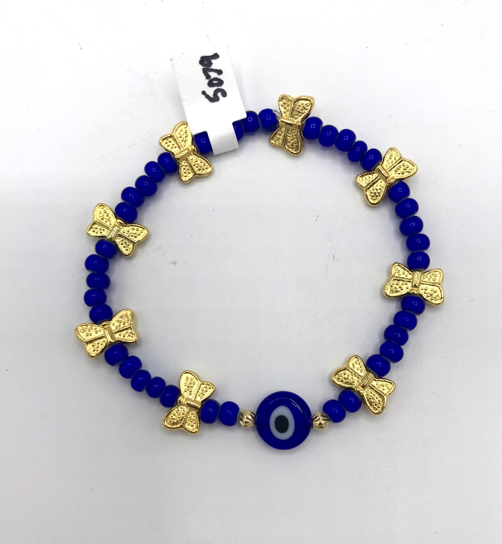 Lapis Blue Beads & Evil Eye With Brass Butterfly Bracelet by Emelie Hebert