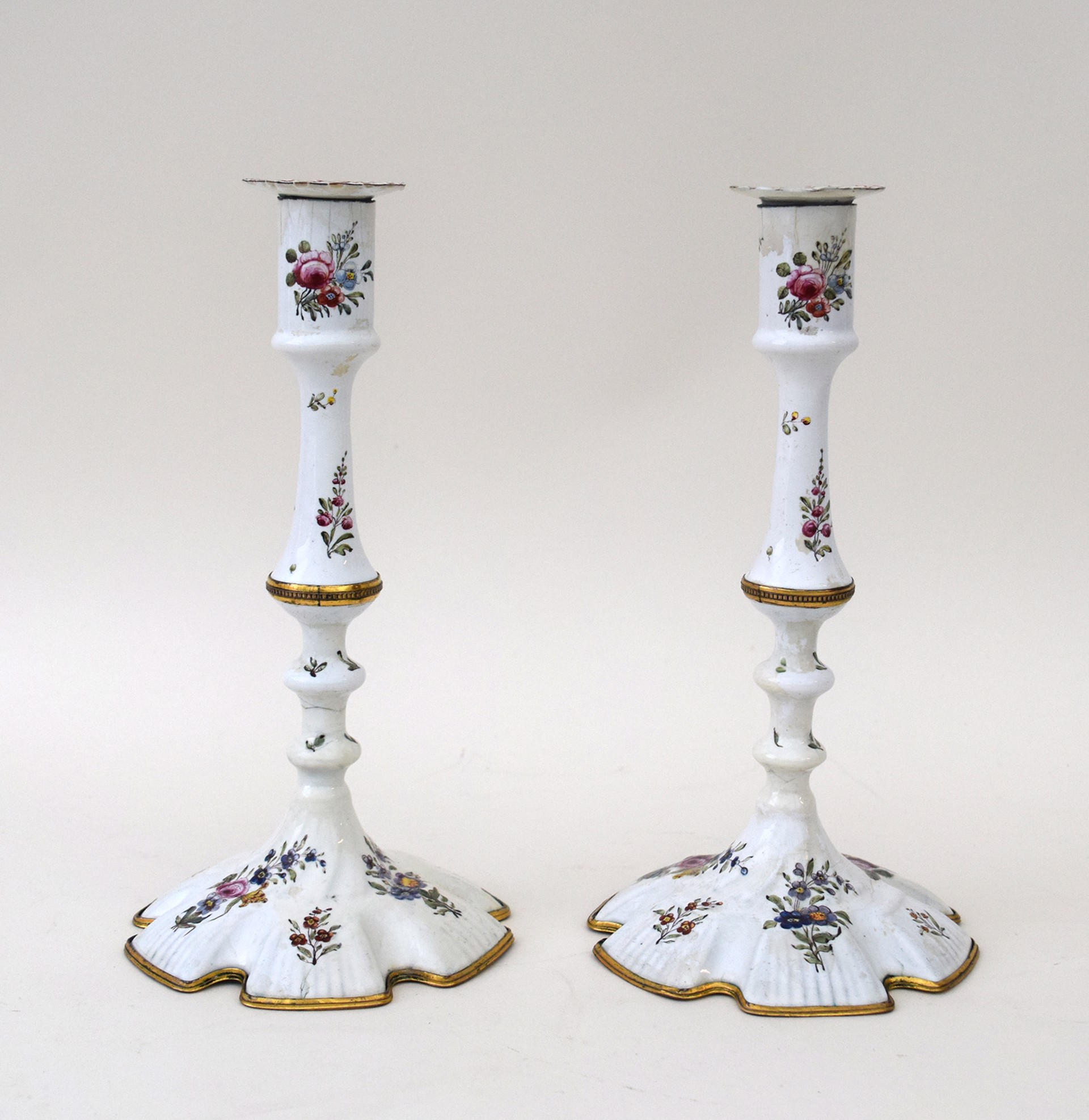 PAIR OF GILT-COPPER-MOUNTED SOUTH STAFFORDSHIRE ENAMEL CANDLESTICKS, PROBABLY BILSTON