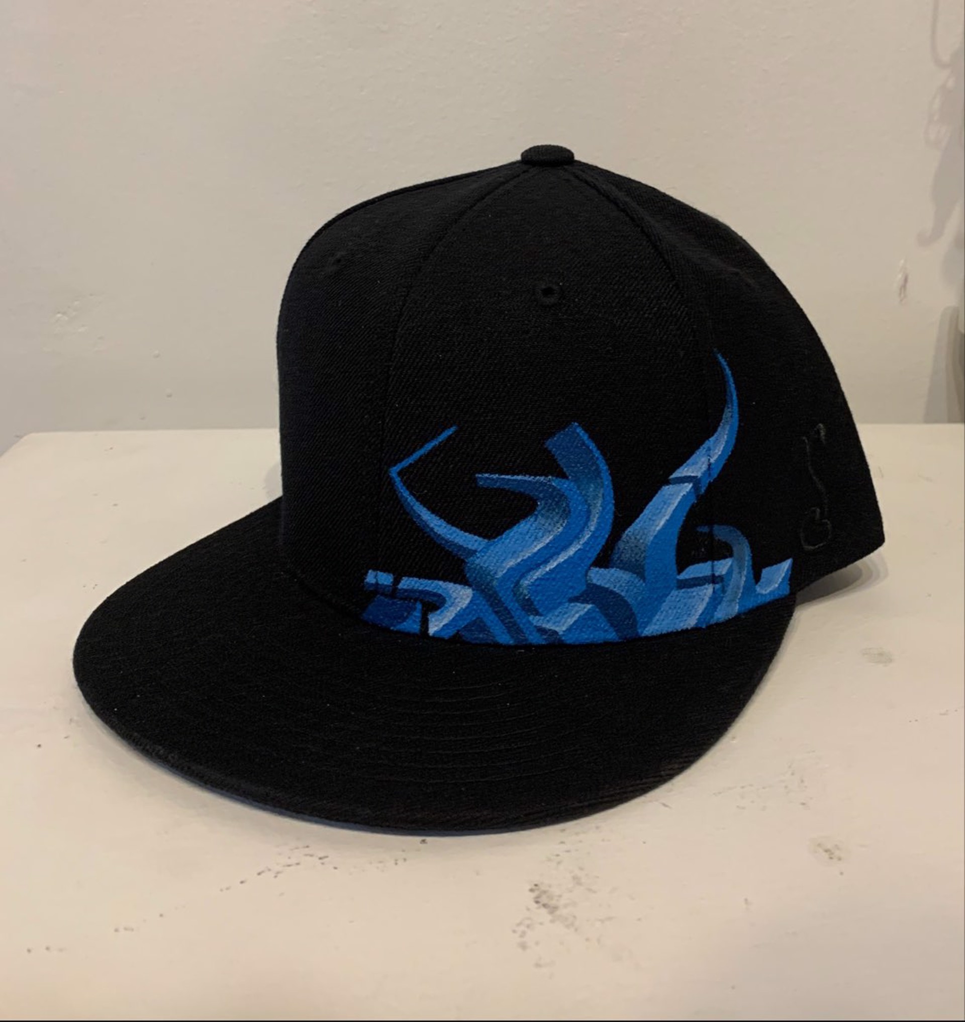 Blue Flame Hat by Tyler Riston