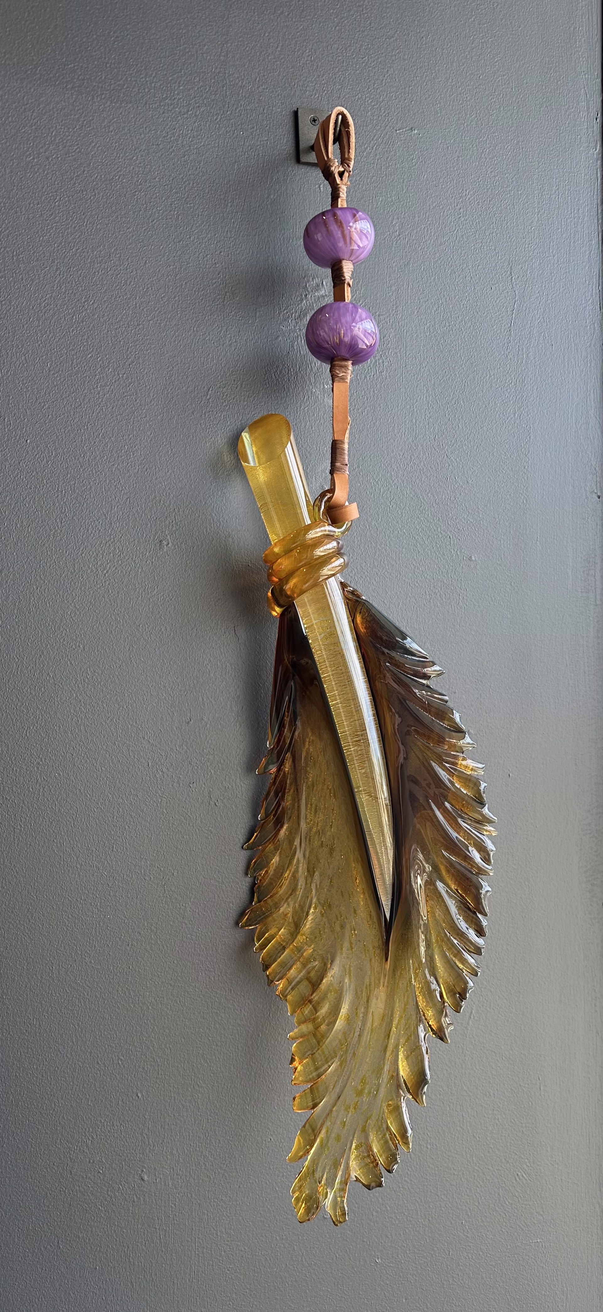 Golden Topaz - Hanging Feather by Nic McGuire