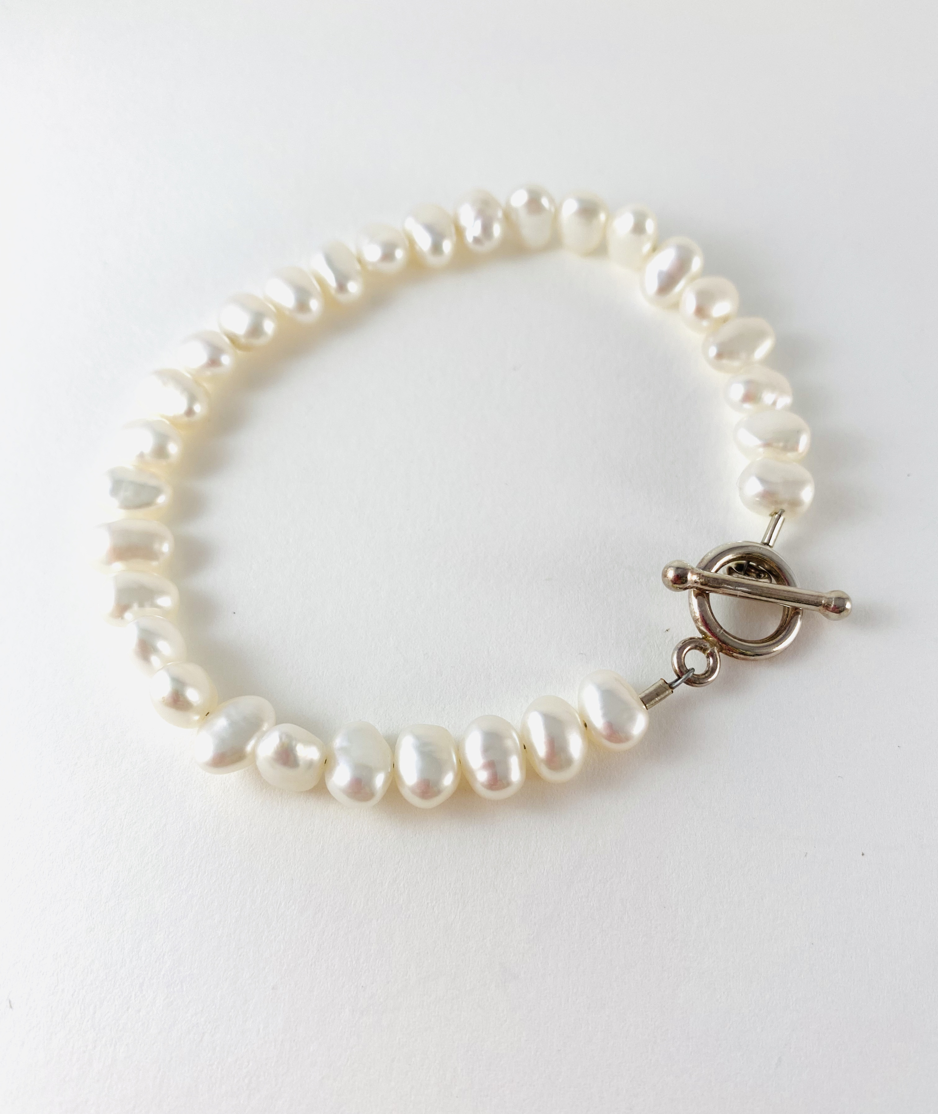 Flat White Pearl Bracelet, toggle clasp P8 by Nance Trueworthy