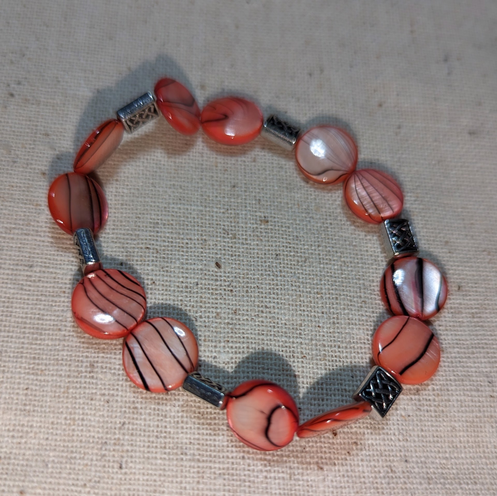 Coral bead stretch bracelet by Betty Binder