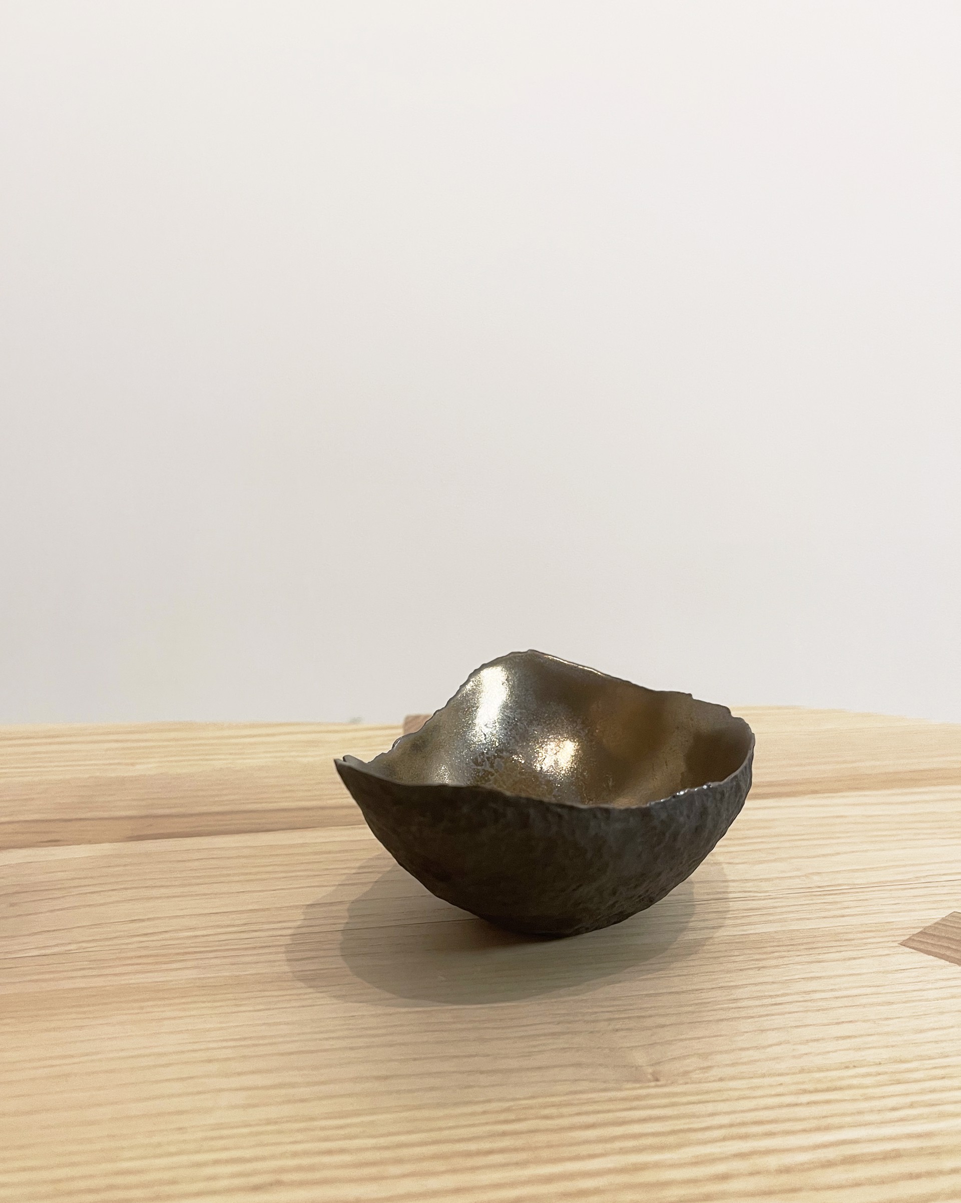 Vessel with bronze textured glaze by Cristina Salusti