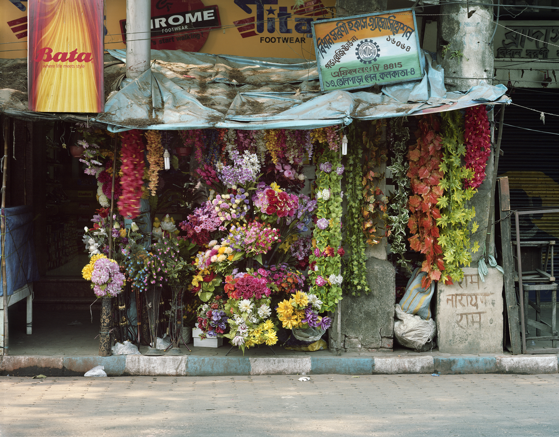 Sidewalk Flower Shop by Laura McPhee