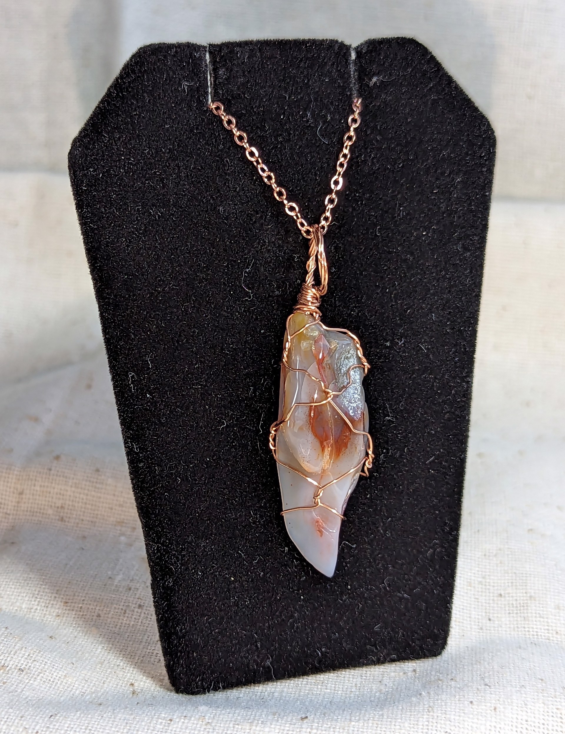 Opalized petrified wood pendant by Betty Binder
