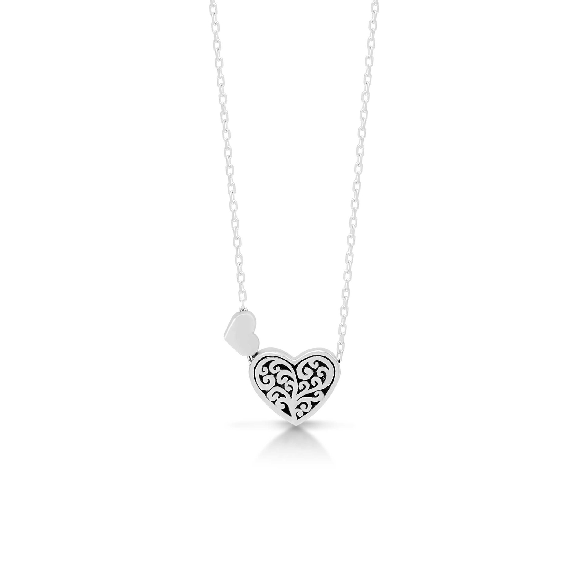 9767 Hand Carved Sterling Silver Heart Pendant with Sister Heart by Lois Hill