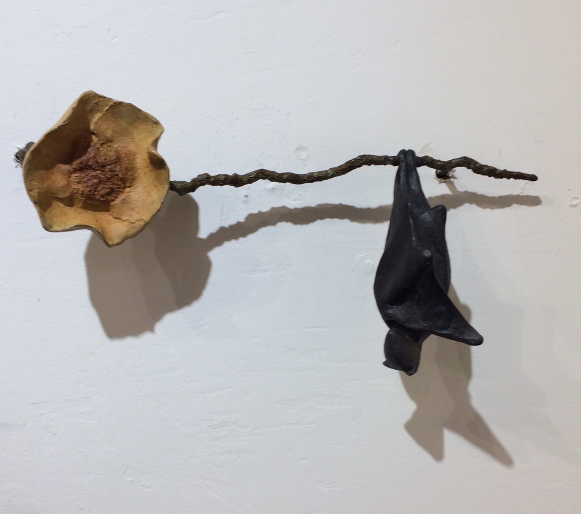 Bat on a Coconut Branch, yellow flower by Copper Tritscheller