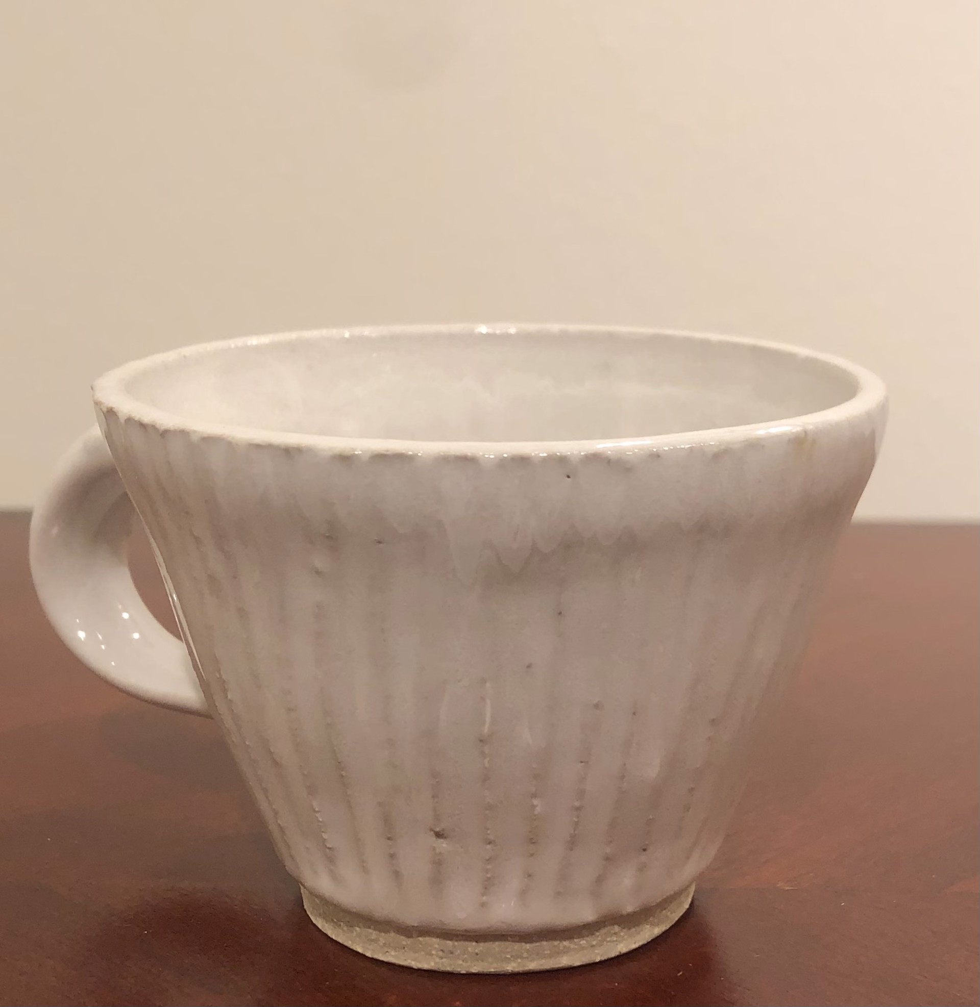 Teacup, vertically carved by Monica Plank