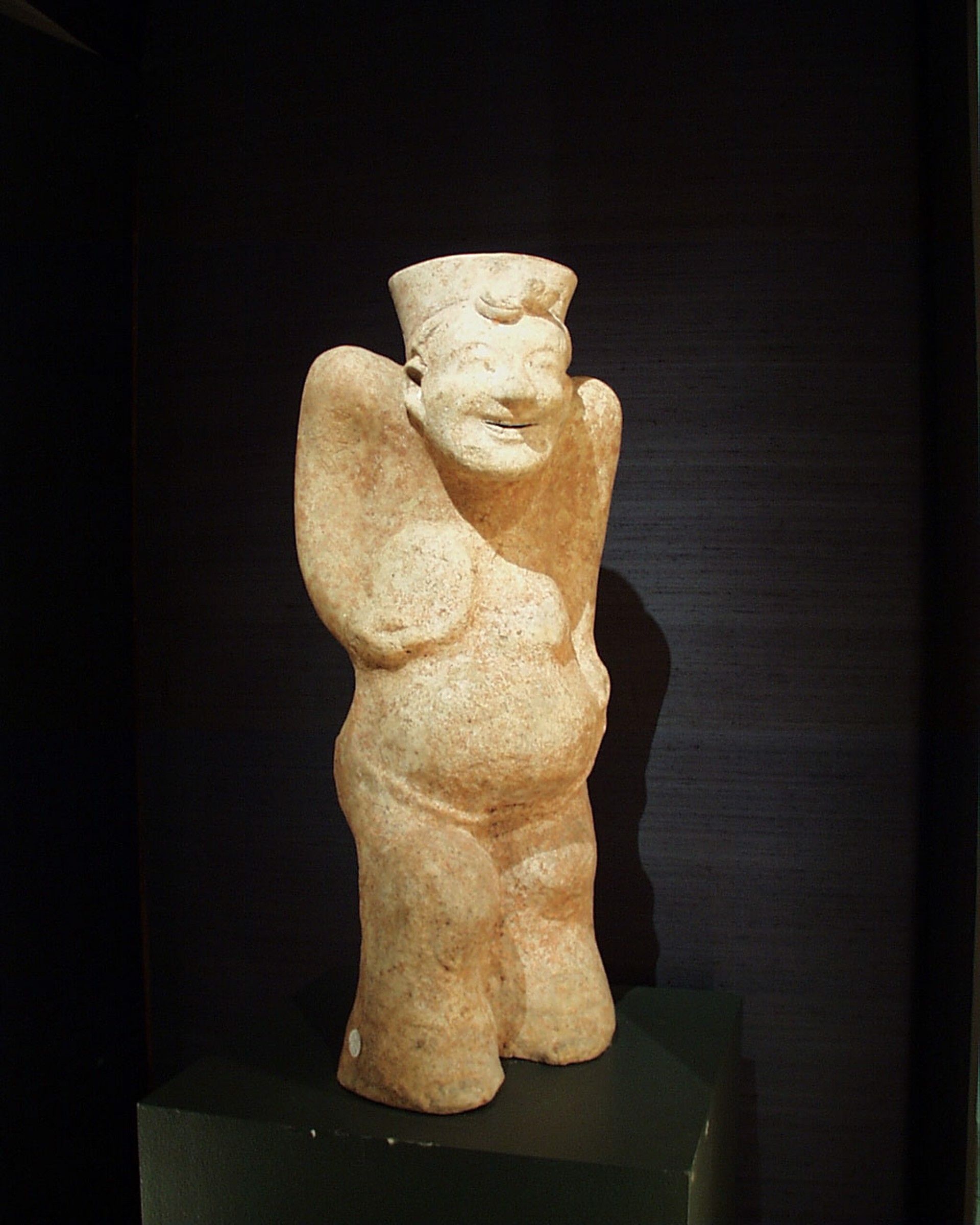 LARGE PAINTED POTTERY FIGURE OF A STORYTELLER
