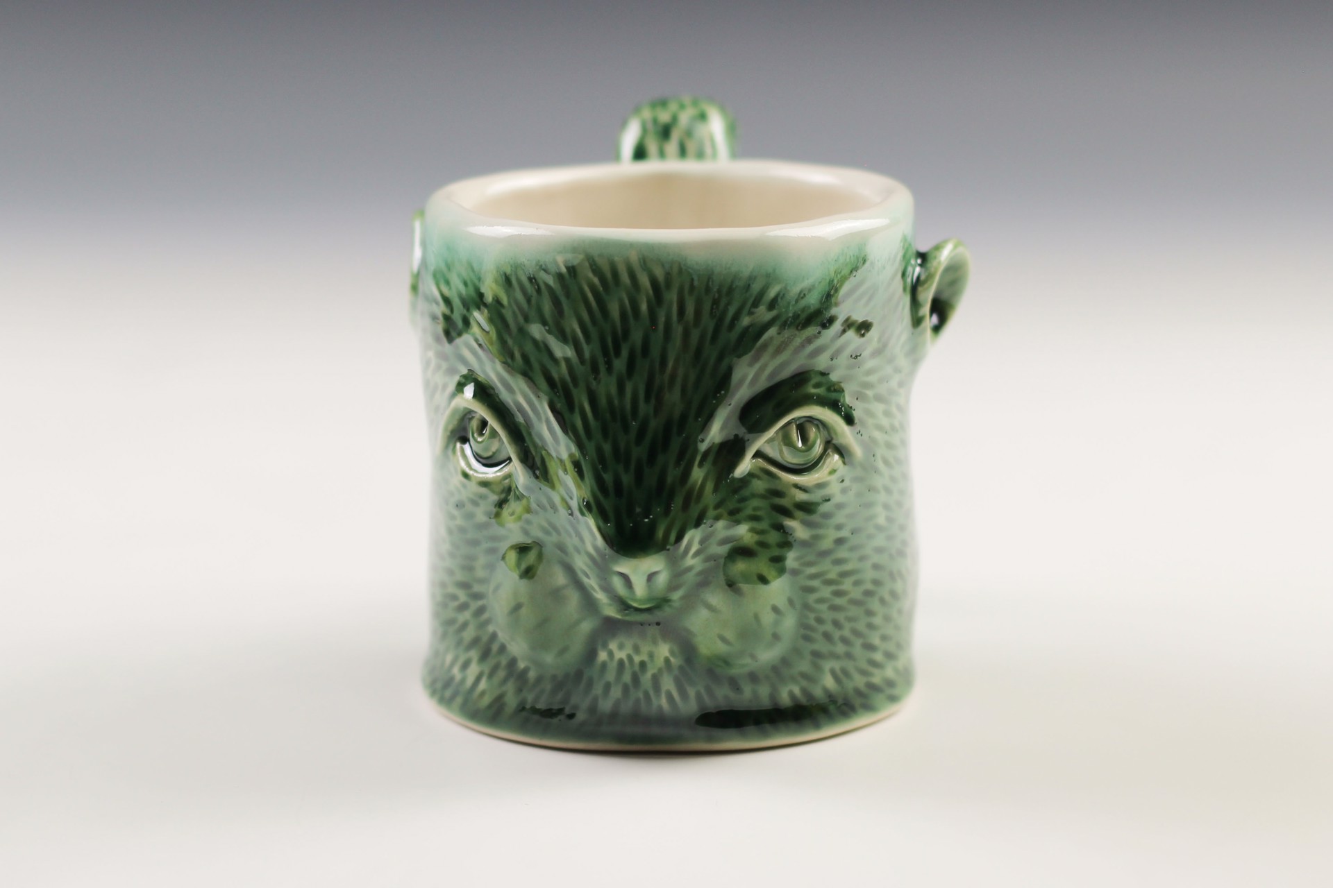 Green Squirrel Mug by Debbie Kupinsky