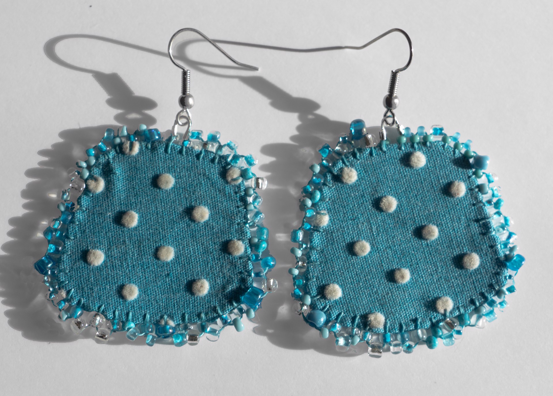 Blue polkadot earrings by Hattie Lee Mendoza