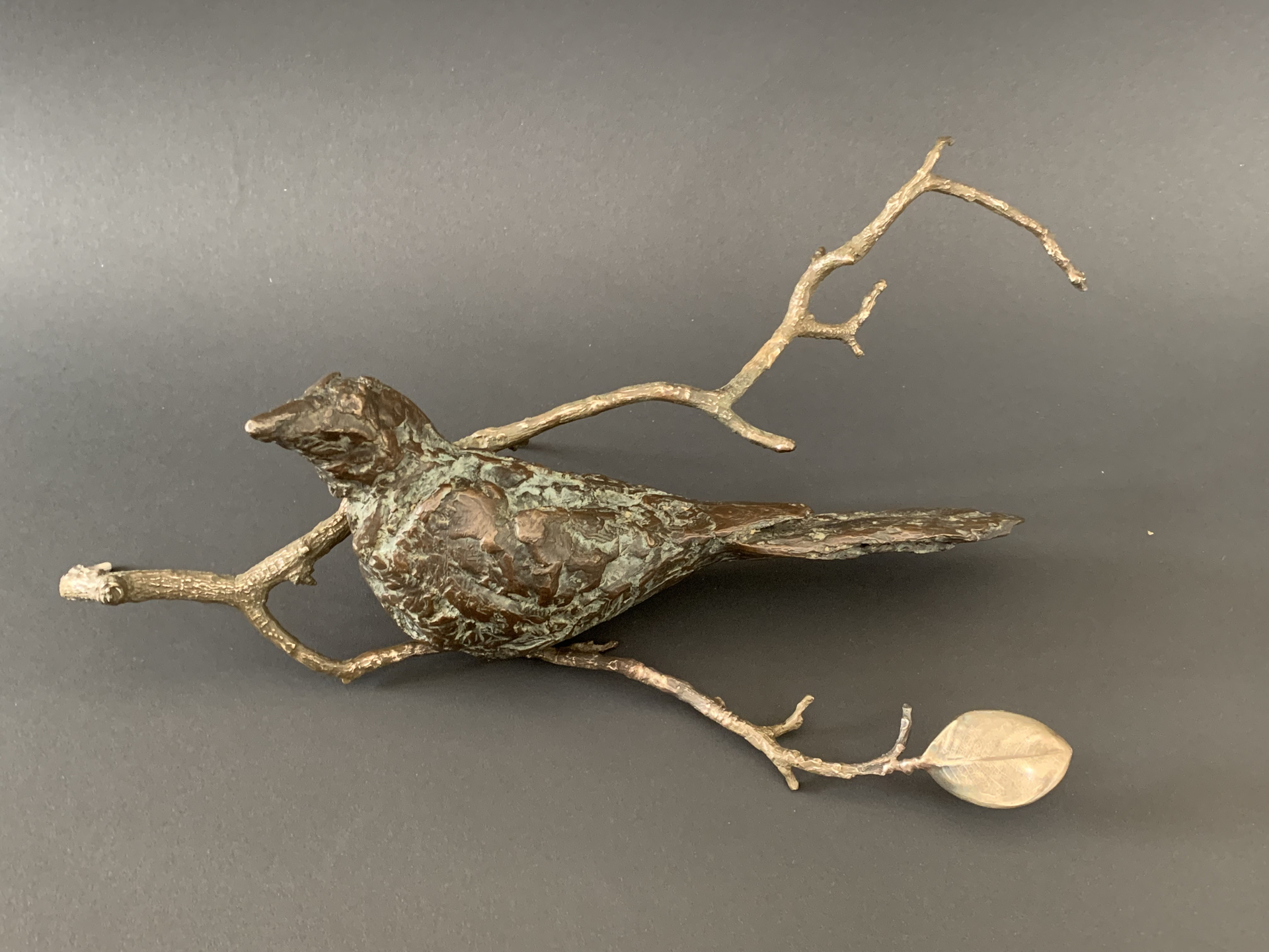Large Bird on Branch by Copper Tritscheller