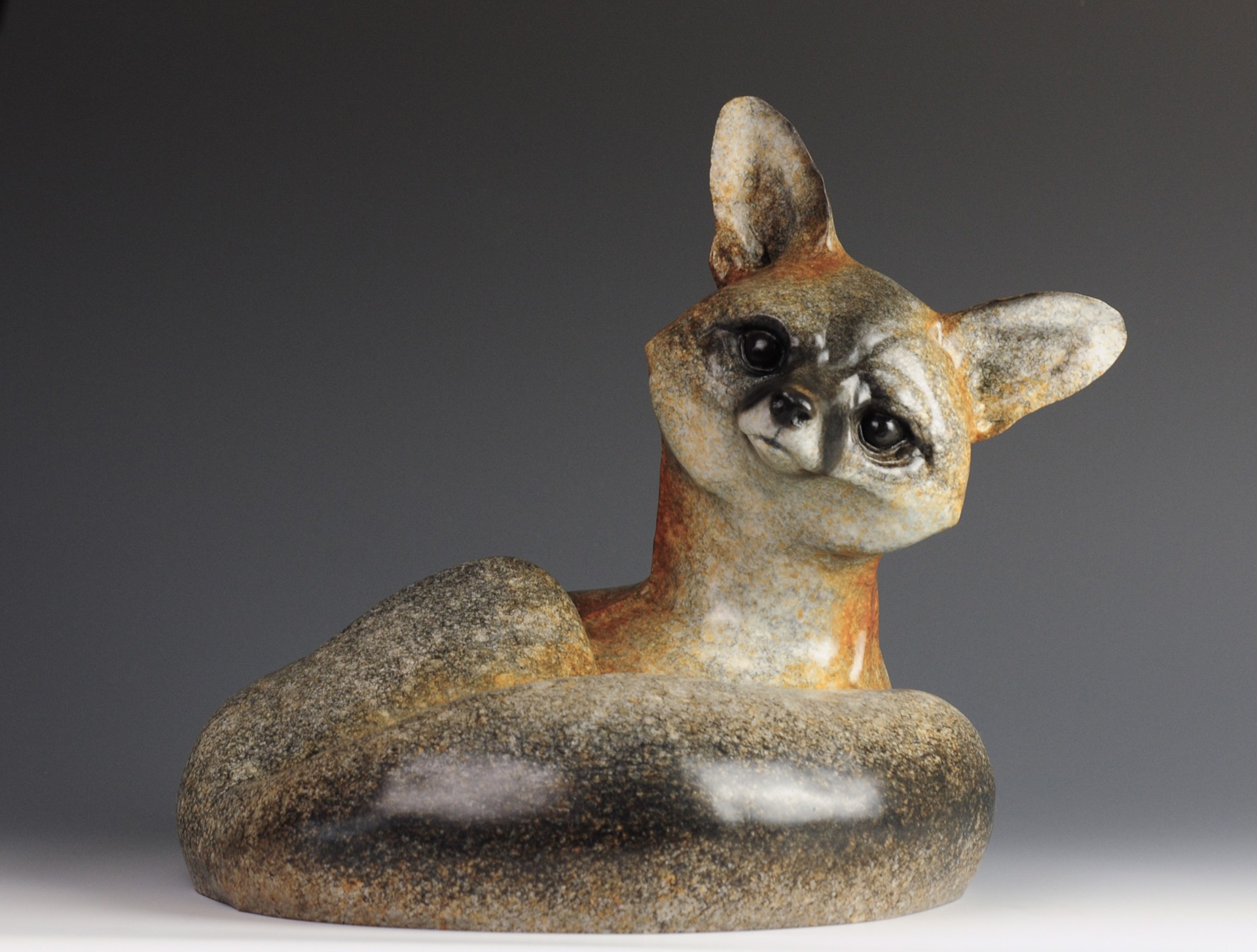 A Fine Art Sculpture In Bronze By Jeremy Bradshaw Featuring A Small Fox With Tilted Head, Available At Gallery Wild