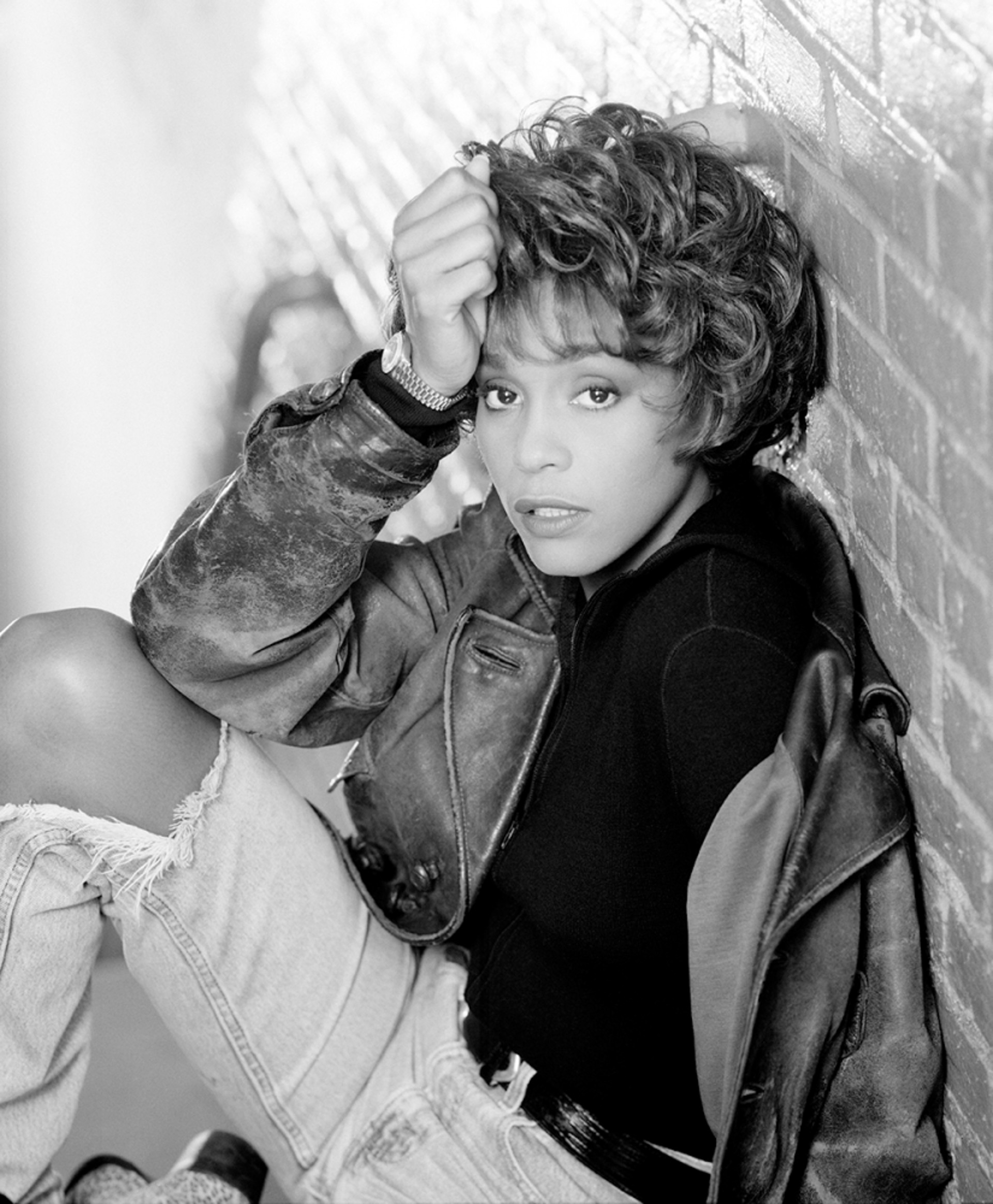 90115 Whitney Houston Crouching Against Brick Wall BW by Timothy White