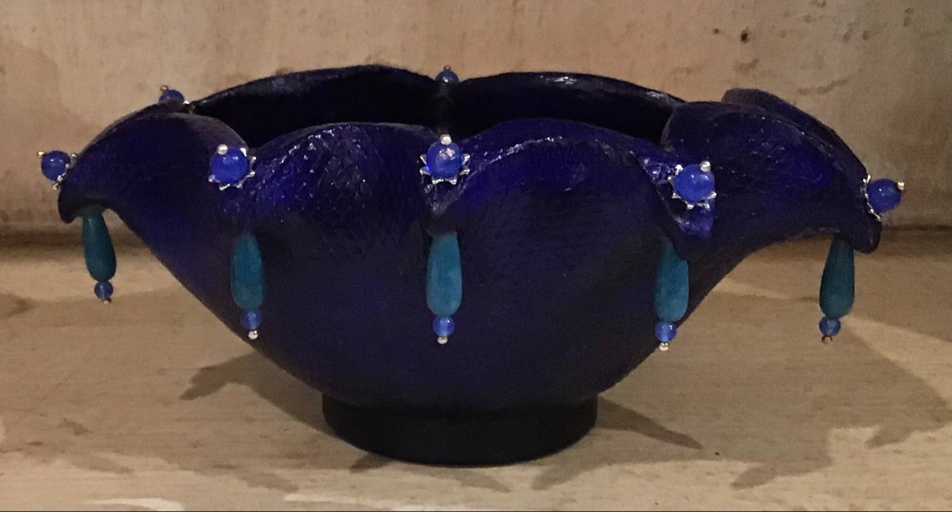 Star Shaped Stones in small blue bowl by Nancy Burns