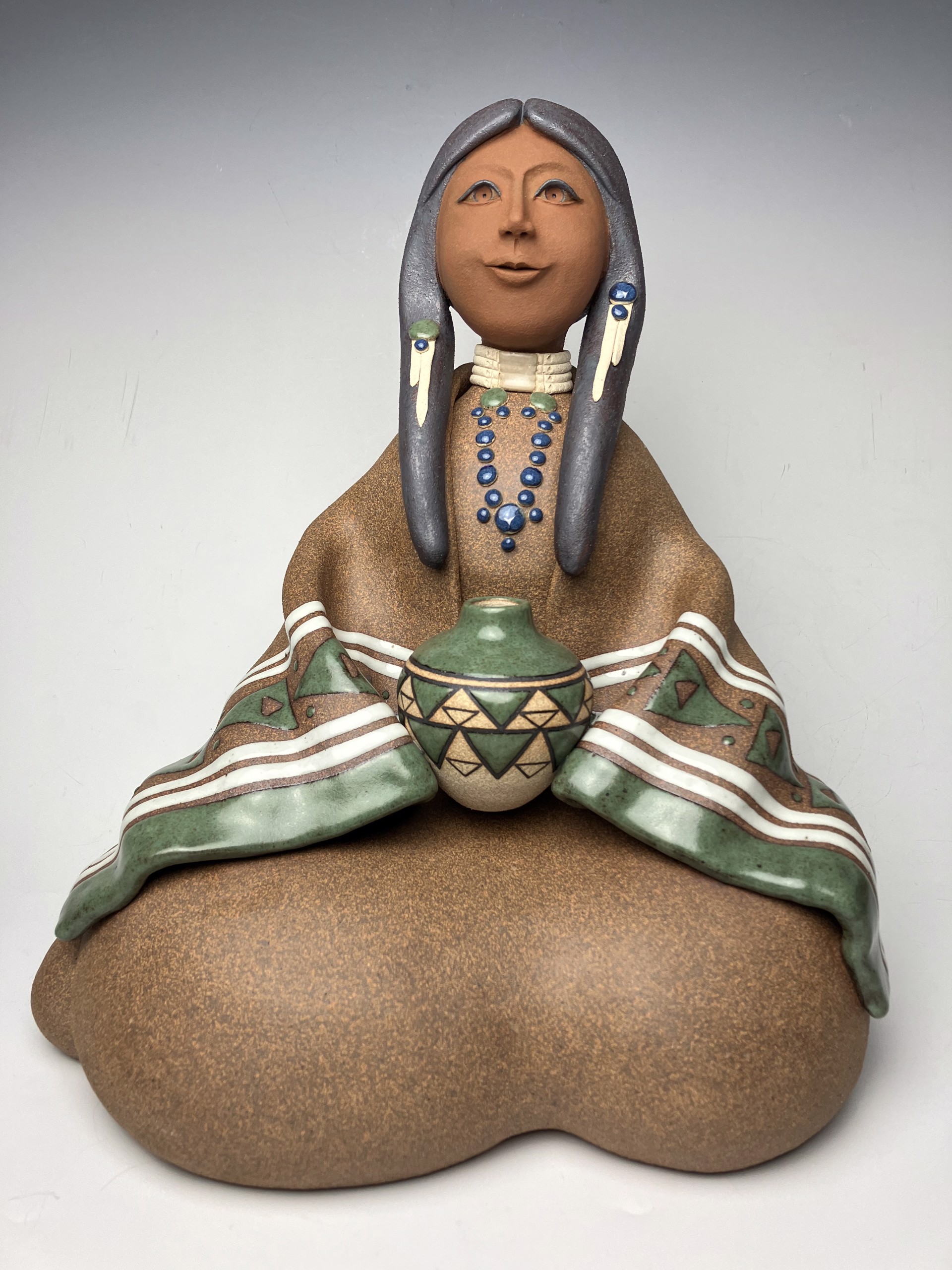 Seated Lakota Woman ~ Green by Terry Slonaker