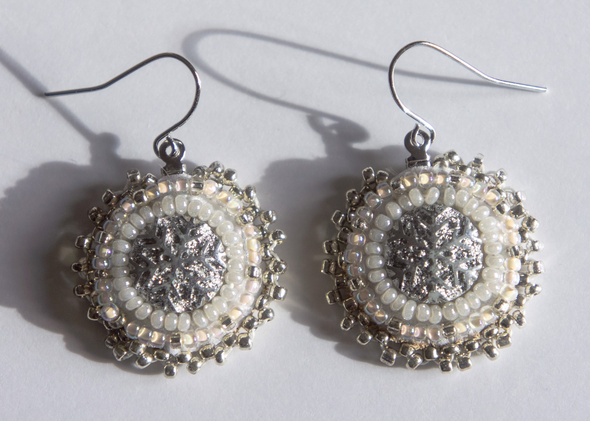 Silver Small Snowflake Earrings by Hattie Lee Mendoza