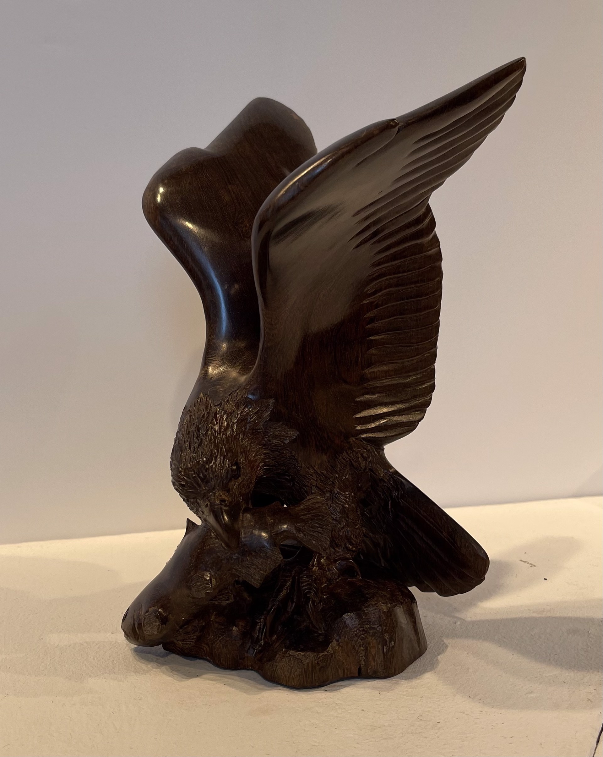 Raised Wing Eagle With Trout by Thomas Suby