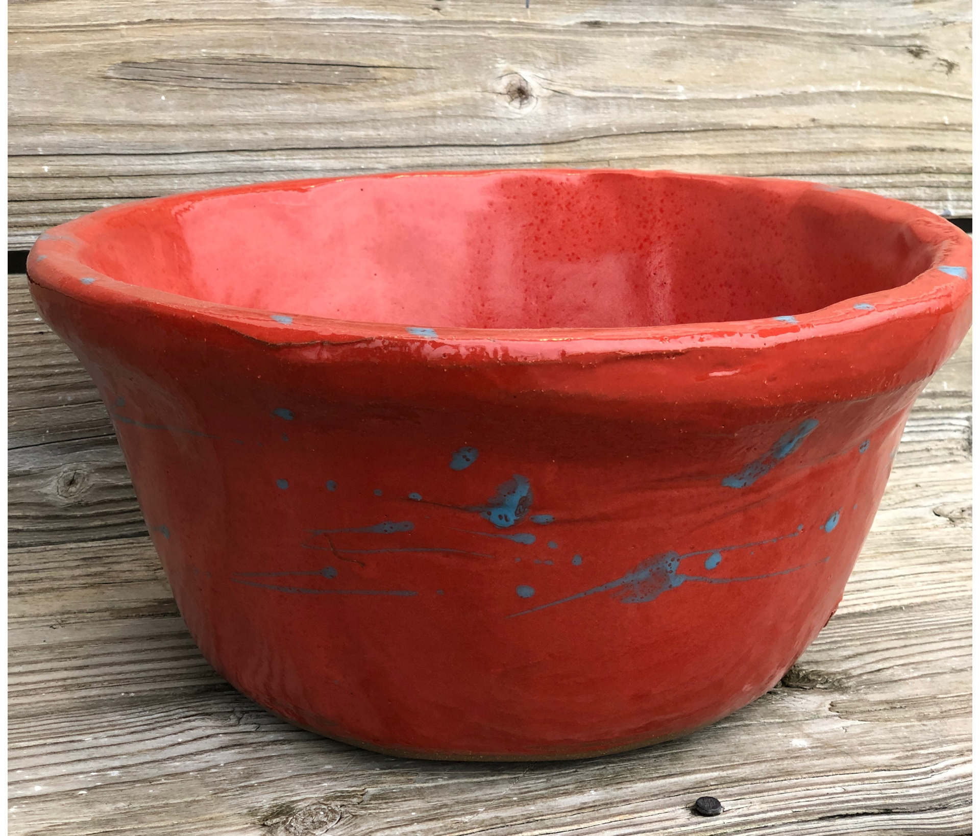 Large red bowl by Jim Jones