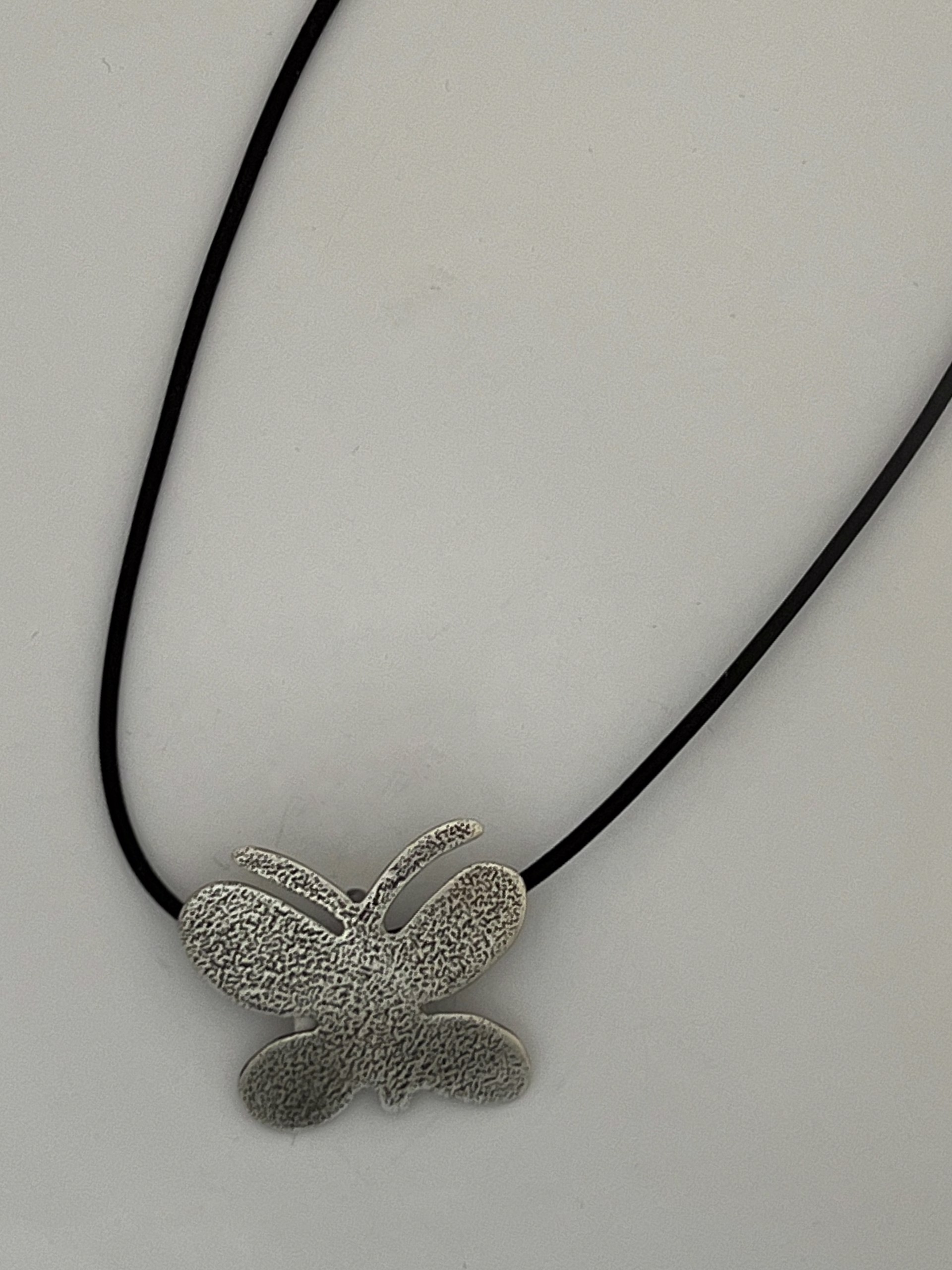 Textured Butterfly pendant by Melanie A. Yazzie