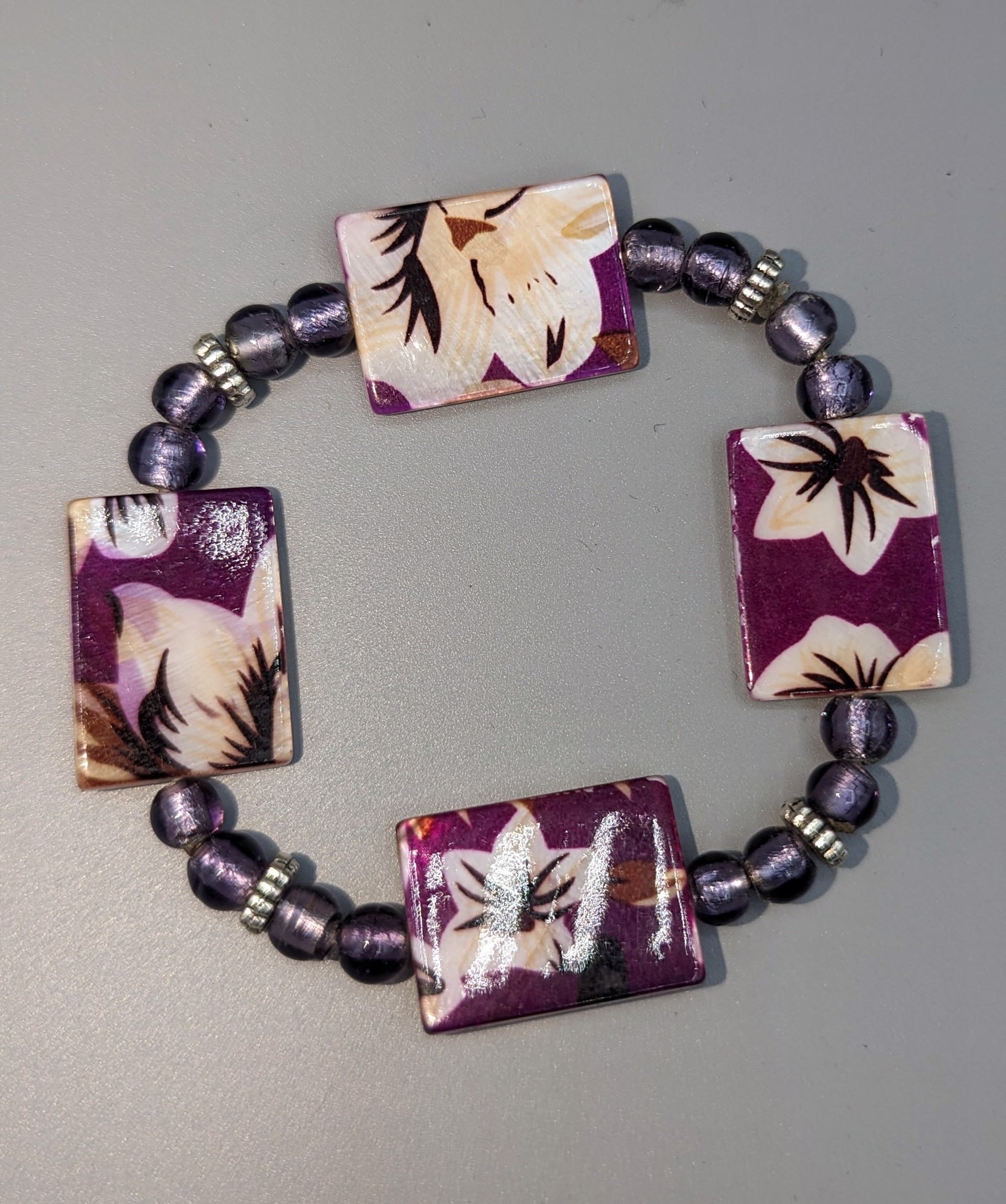 Purple flower stretch bracelet by Betty Binder