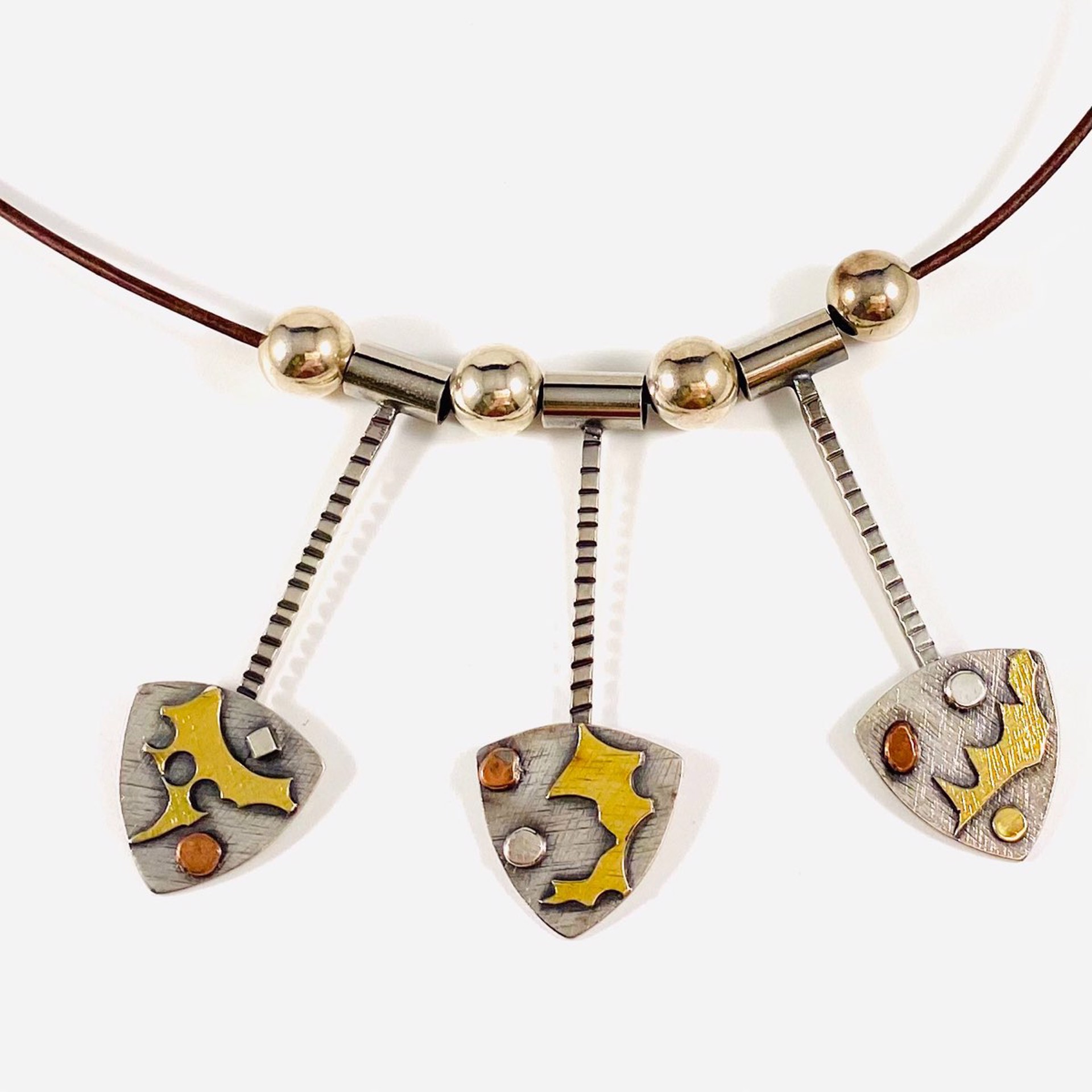 AB22-99 Three Mixed Metal Dangle Pendants on 22"Slim  Leather Necklace by Anne Bivens