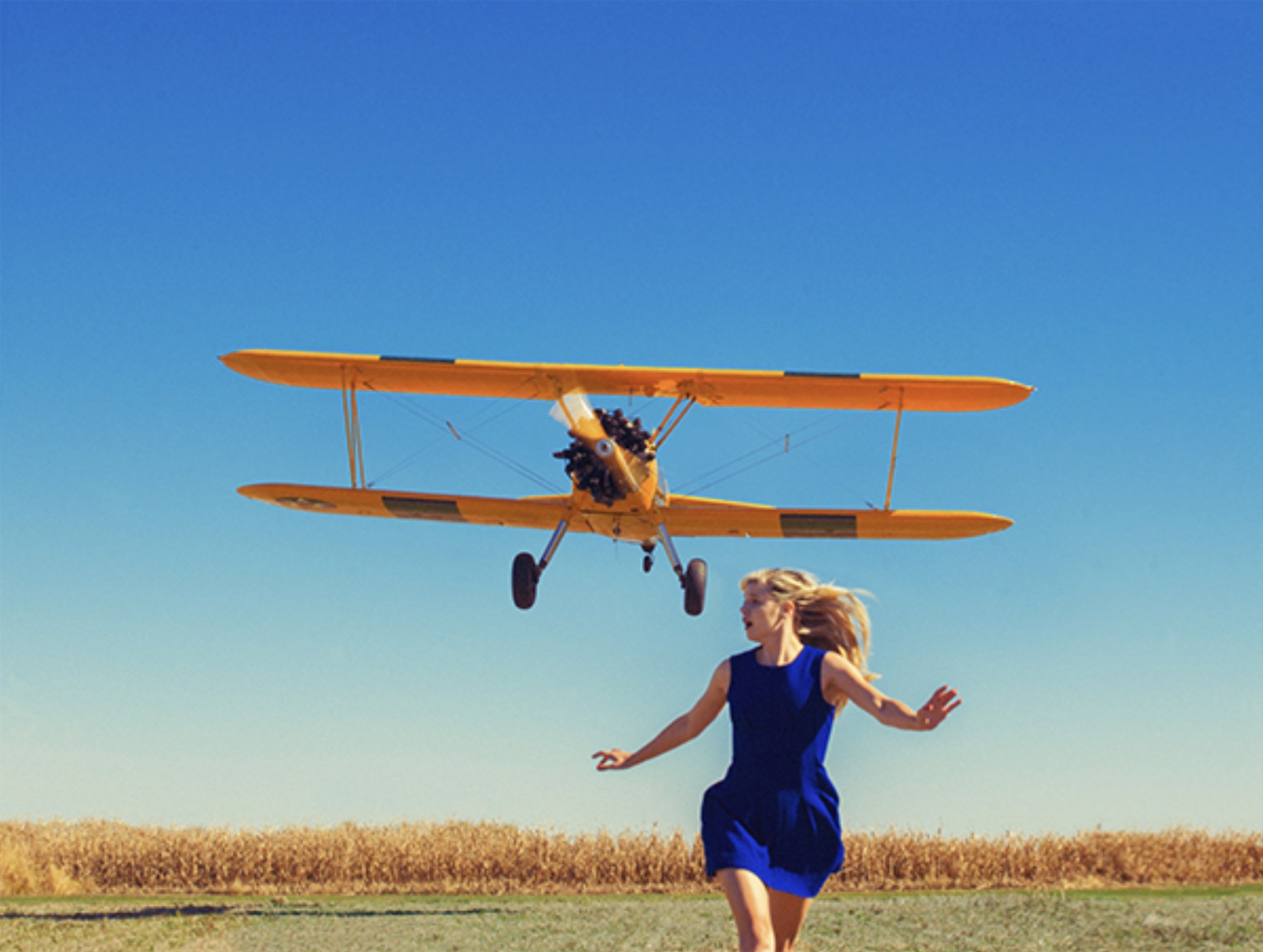 Girl Running From Plane by Tyler Shields