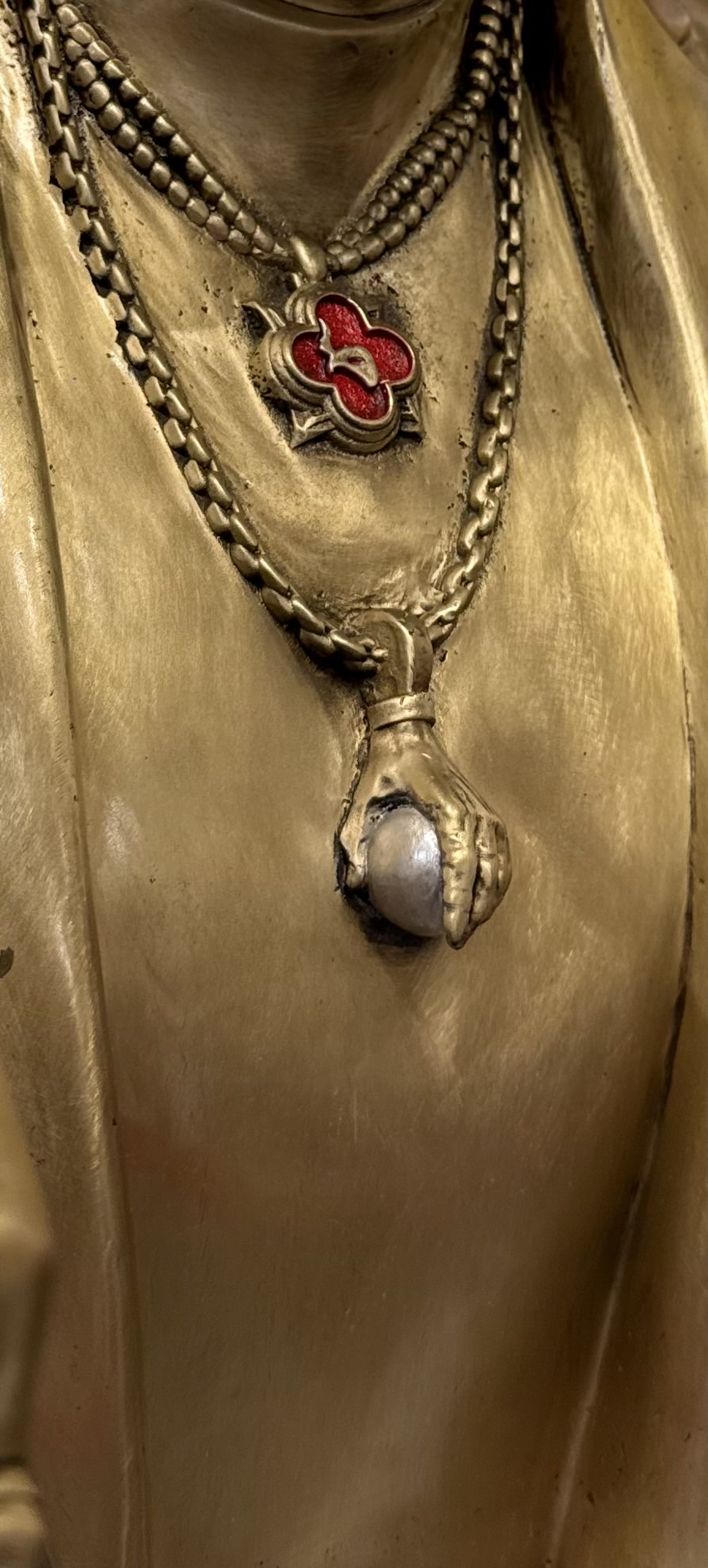 Jewelry created by Matthew Snider for The Gold Standard bronze sculpture