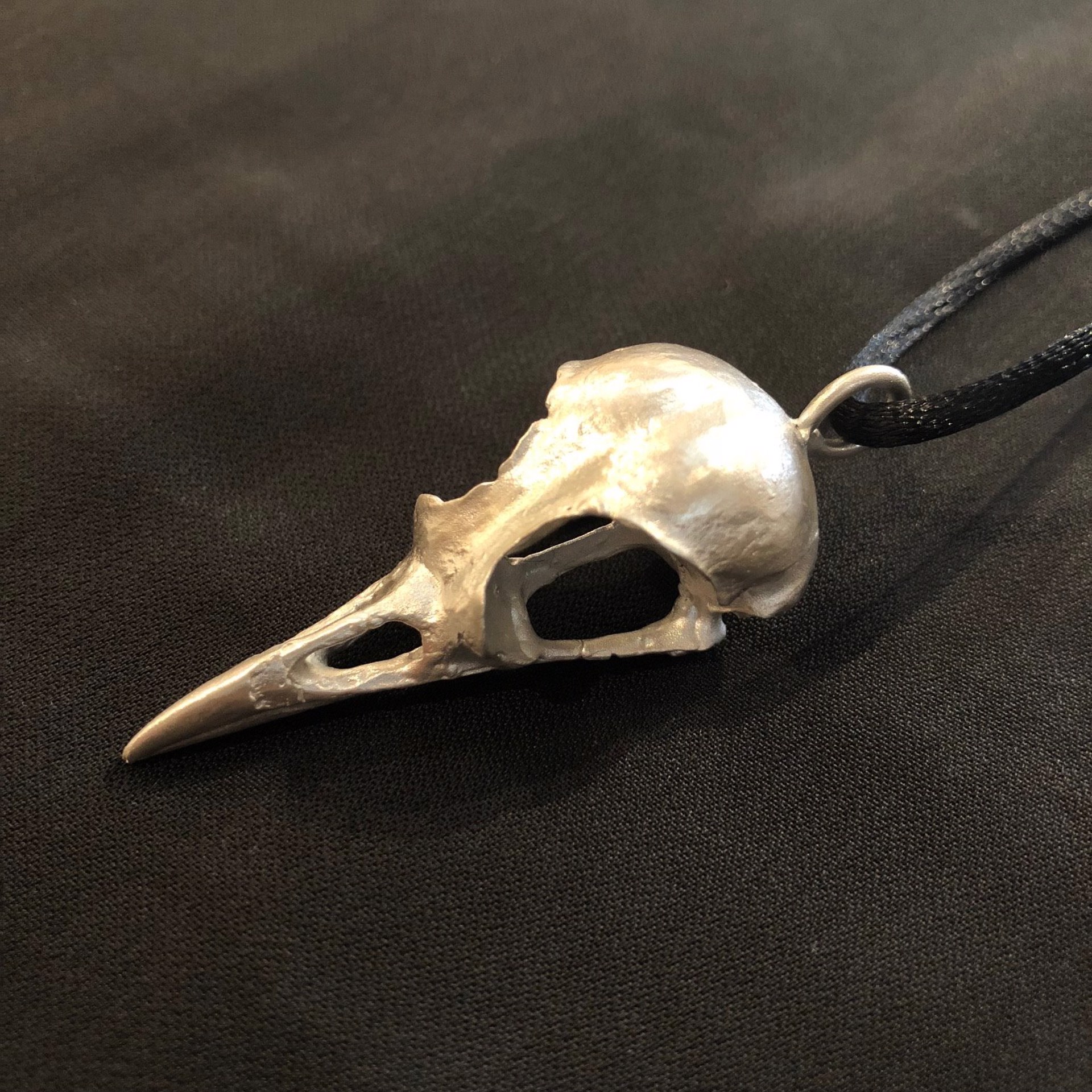 Silver Starling Skull Necklace by Dan Chen | ArtCloud