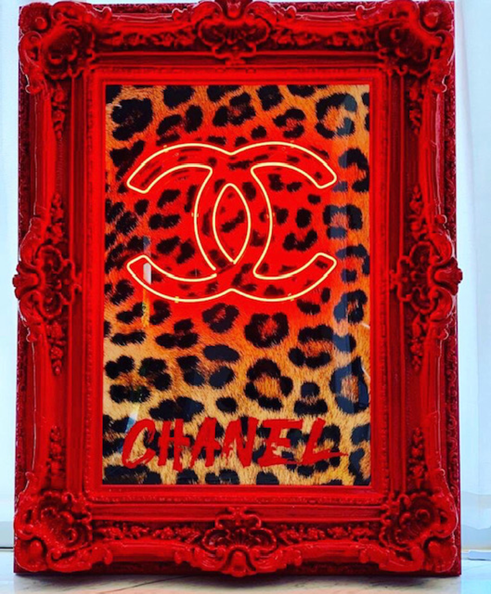 Wild Chanel with Red Frame by Behind Pink Walls