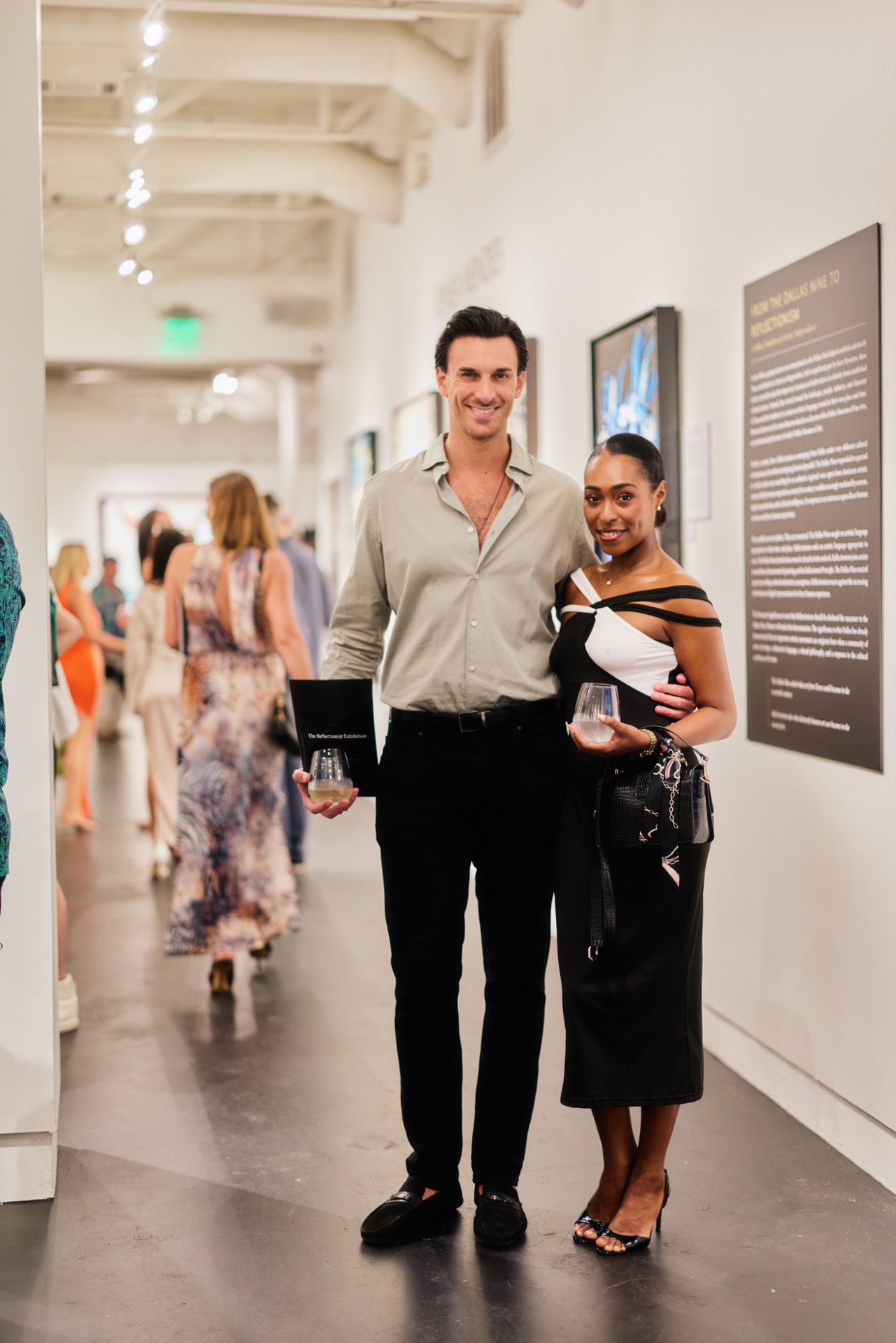 Guests on opening night of the Inaugural Reflectionist Exhibition at Samuel Lynne Galleries, Dallas