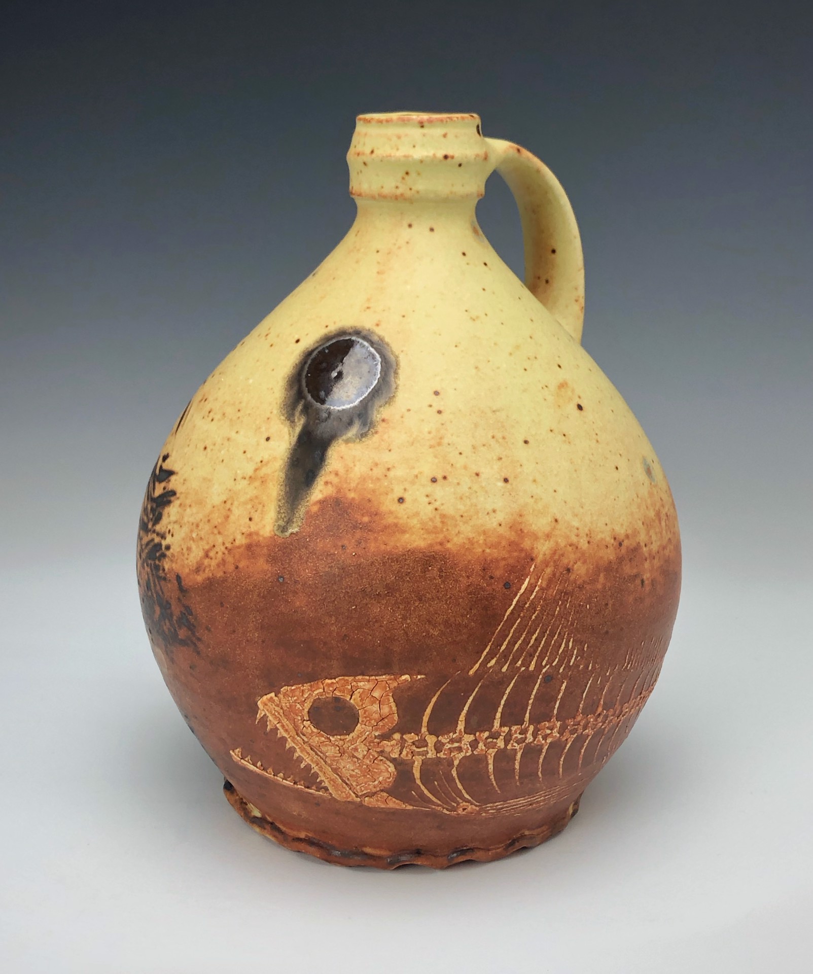 Fossil Fish Jug by Bulldog Pottery | ArtCloud