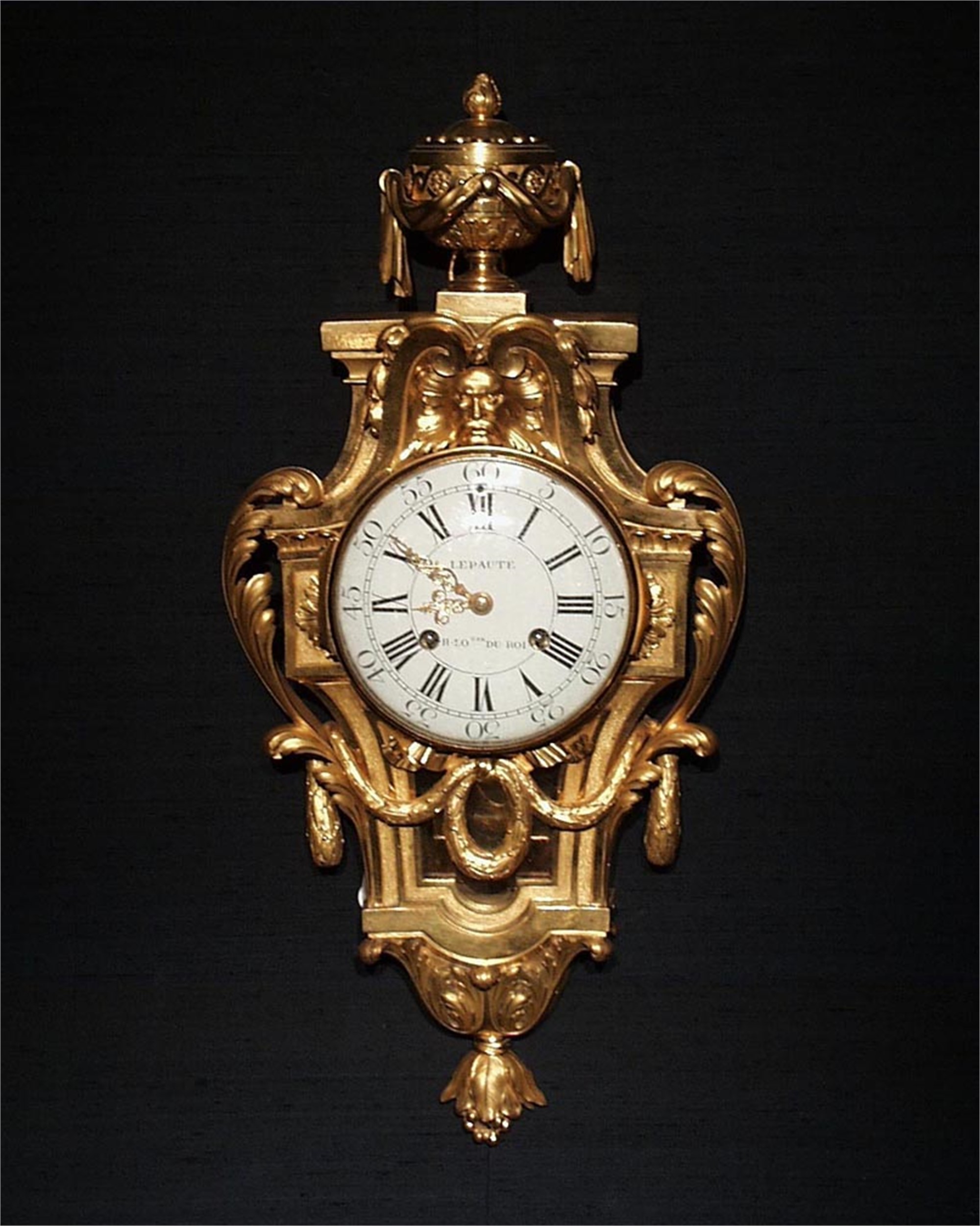 LOUIS XVI BRONZE CARTEL CLOCK WITH MASK AND GARLANDS BY LEPAUTE by Jean ...