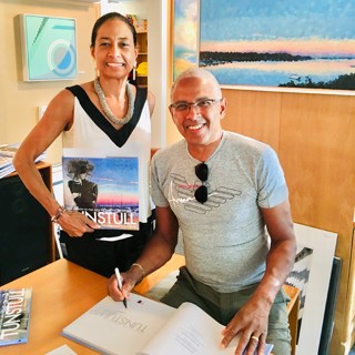 Zita Cousens with artist Glen Tunstull at his exhibition. —Courtesy Cousen Rose Gallery